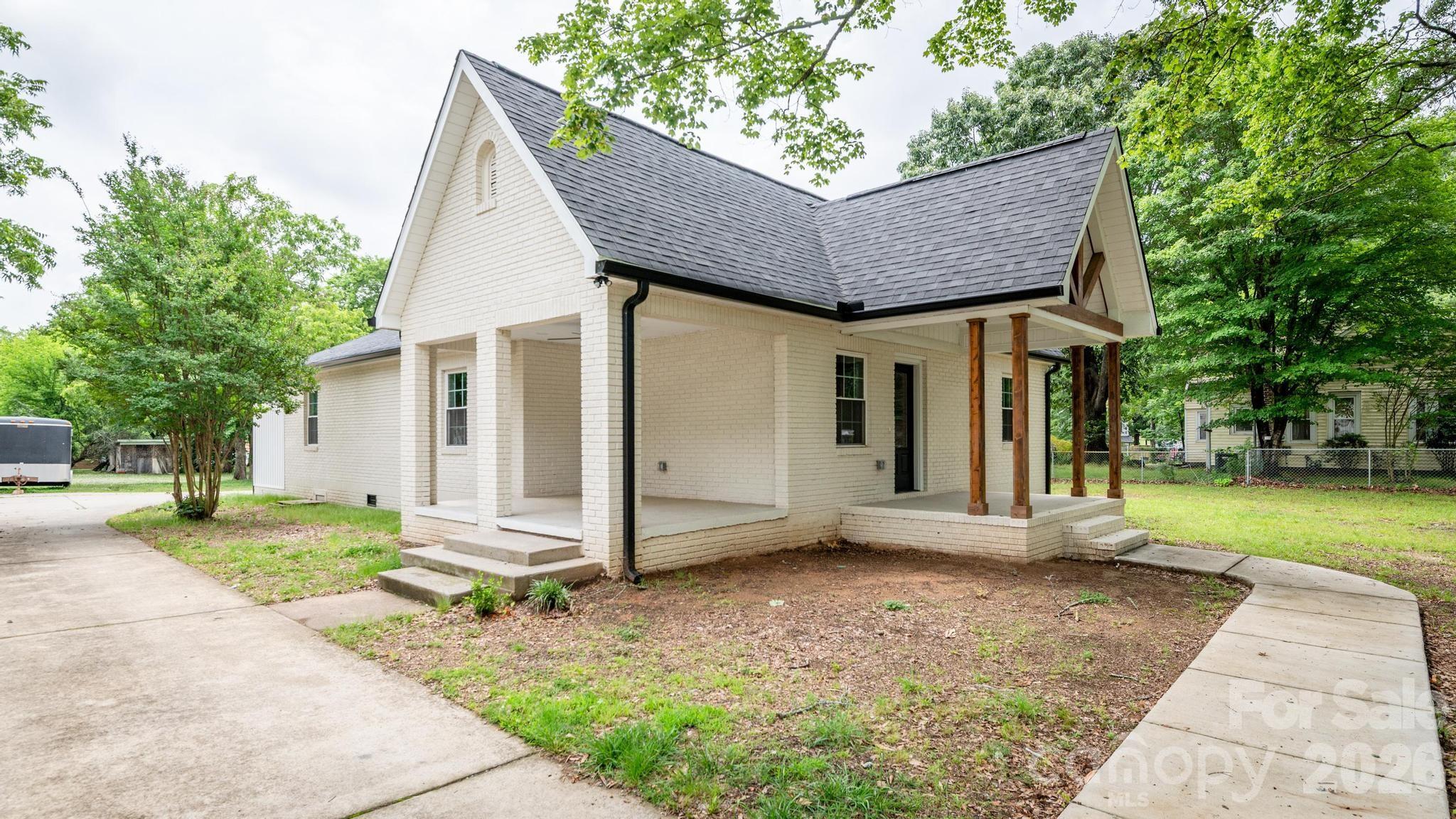 Single Family Residence at 1225 Old Charlotte Road SW, Concord, photo 4 of 32