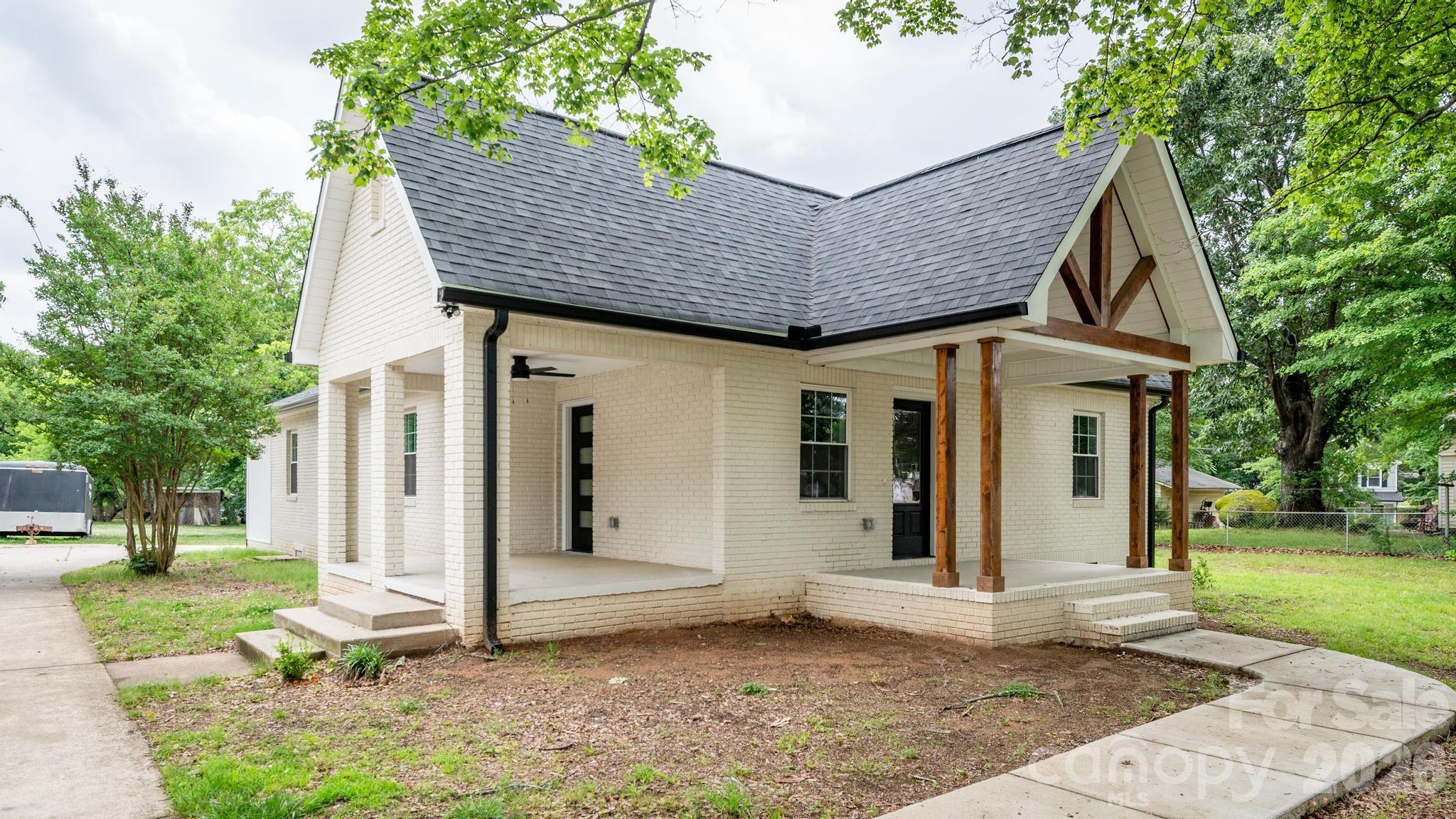 Single Family Residence at 1225 Old Charlotte Road SW, Concord, photo 6 of 32