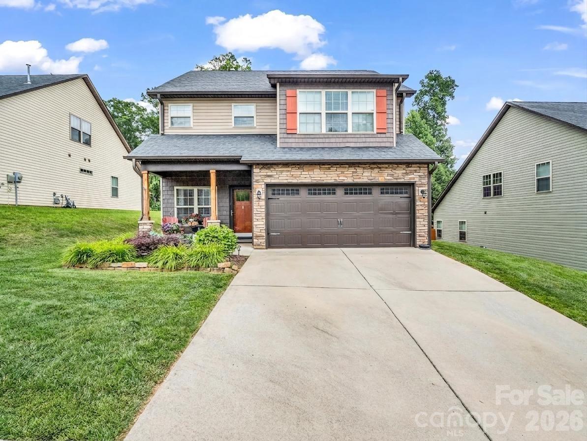 This beautiful home provides a two car garage with plenty of driveway parking as well. - 8 Mallard Run Drive, Arden