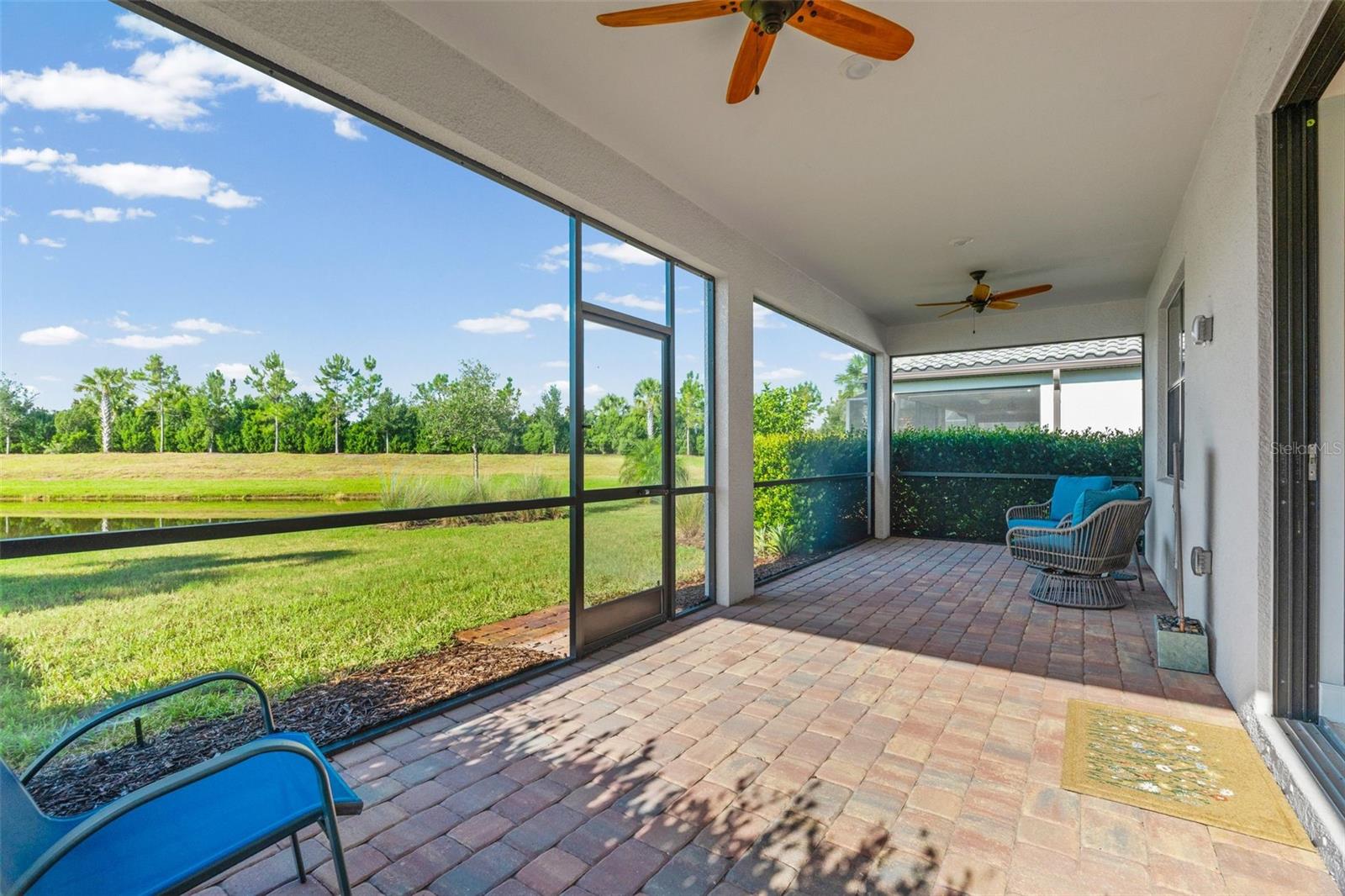 Lanai with pond view - 17726 NORTHWOOD PL, BRADENTON