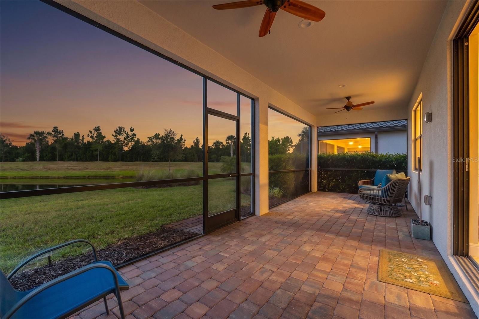 Lanai with pond view - 17726 NORTHWOOD PL, BRADENTON