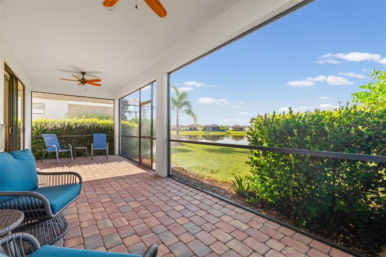 Lanai with pond view - 17726 NORTHWOOD PL, BRADENTON