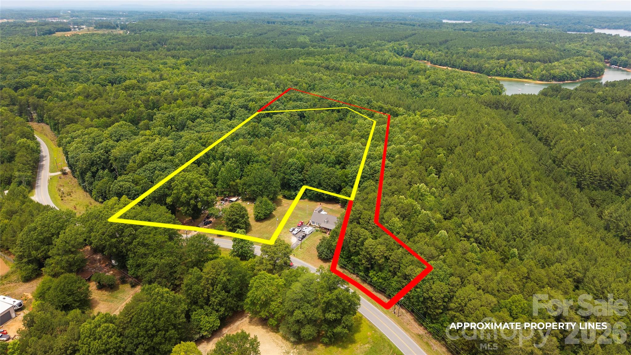 Tract 1 - 7.81+/- acres w/ house. Tract 2 - 3.87+/- acres - 8628 Island Point Road, Sherrills Ford