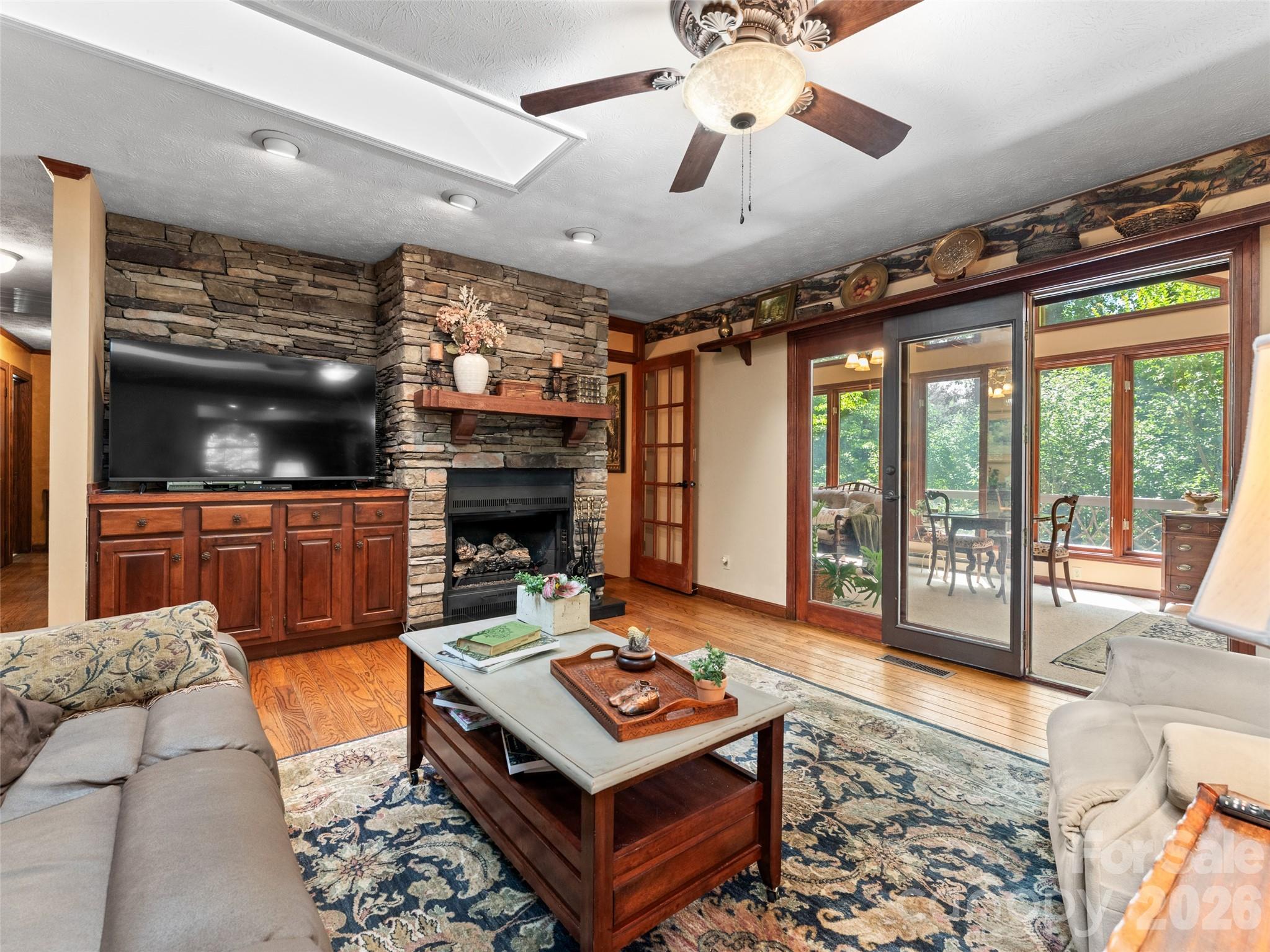 Family Room with Access to Sunroom - 3 Westbridge Drive, Hendersonville