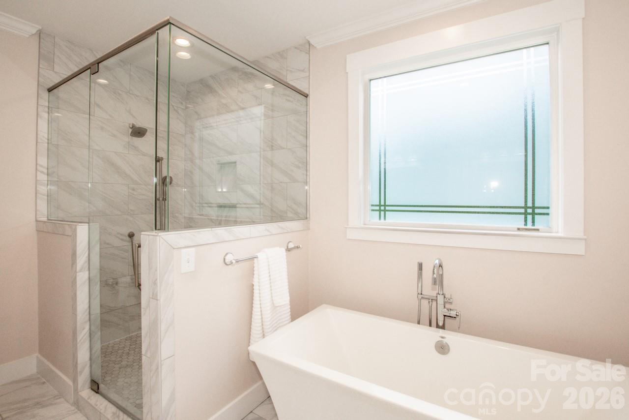 Deep soaking tub and tiled shower with dual shower heads - 155 Wood Acre Drive, Mooresville