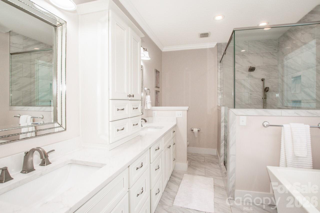 Custom cabinets, dual vanities, and quartz countertops - 155 Wood Acre Drive, Mooresville