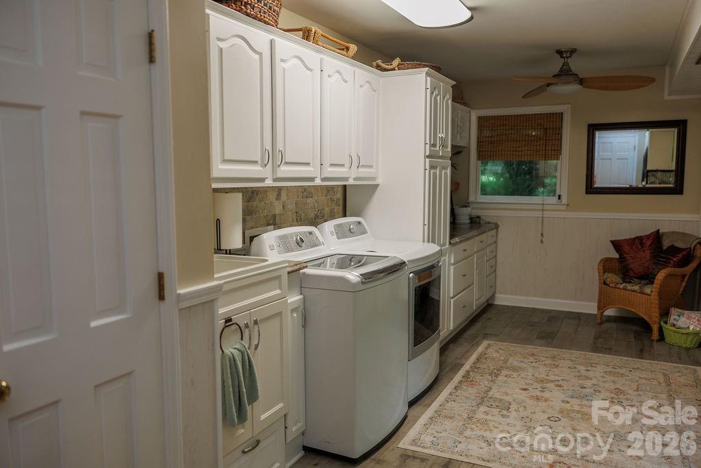 Washer, dryer, and laundry sink with a laundry shoot - 119 Country Meadow Lane, Kings Mountain