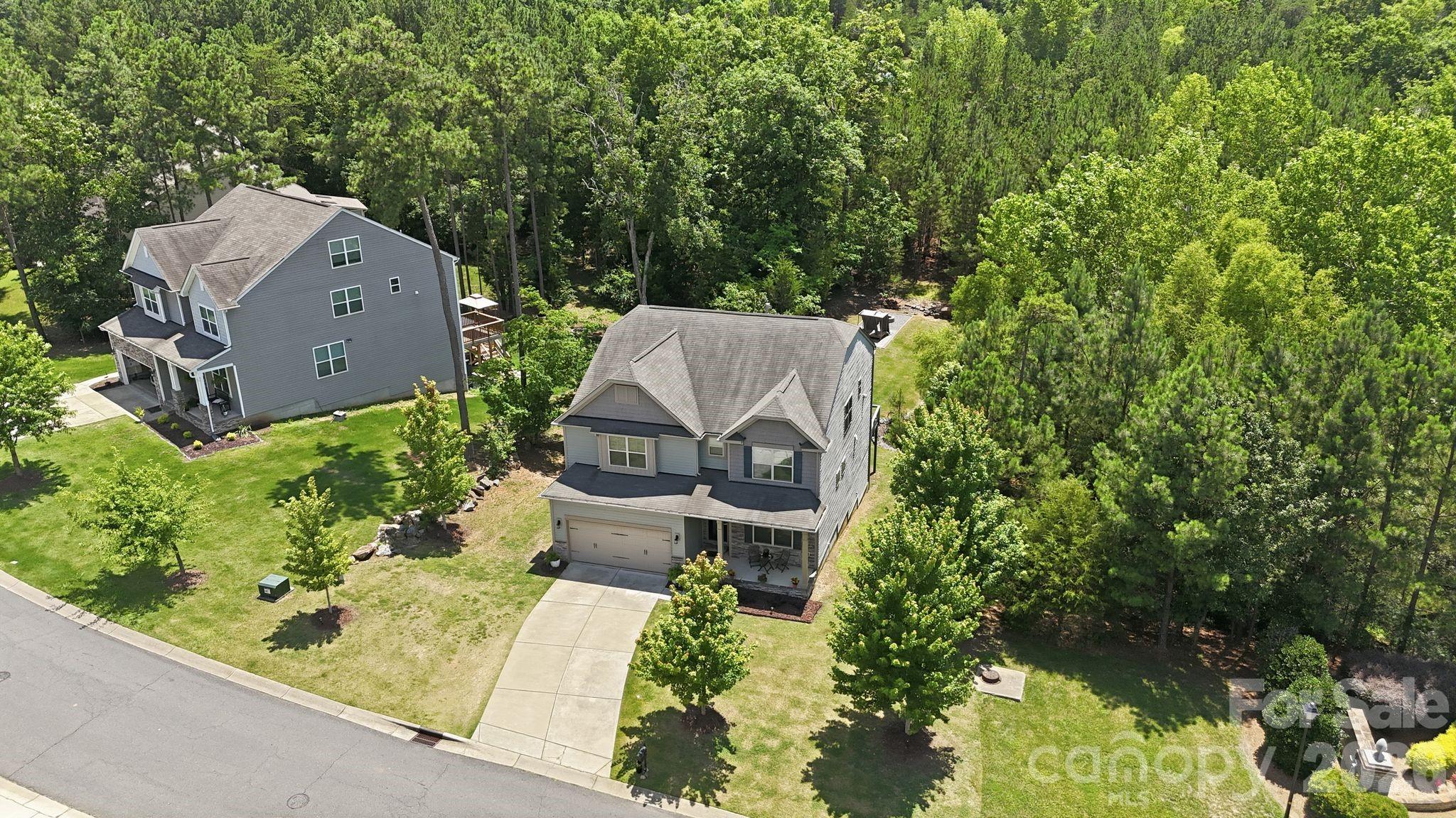 Front of house with one neighbor - 4870 Summerside Drive, Lake Wylie