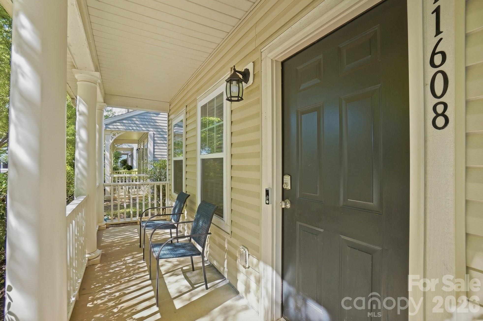 A covered front porch to unwind after a long day. - 11608 Galashiels Drive, Huntersville