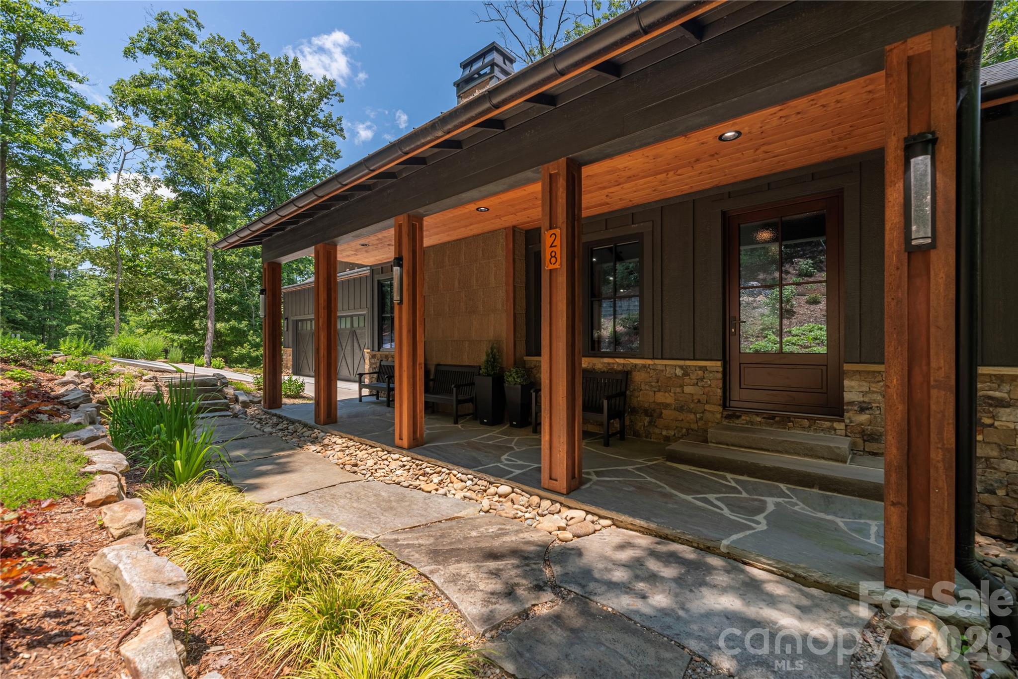 Covered front porch with riverstones and lovely landscaping - 28 Garren View Drive, Fairview