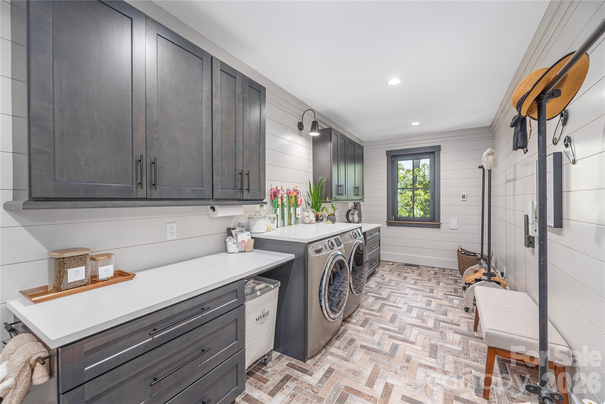 Large laundry/mudroom with heated tile floors - 28 Garren View Drive, Fairview