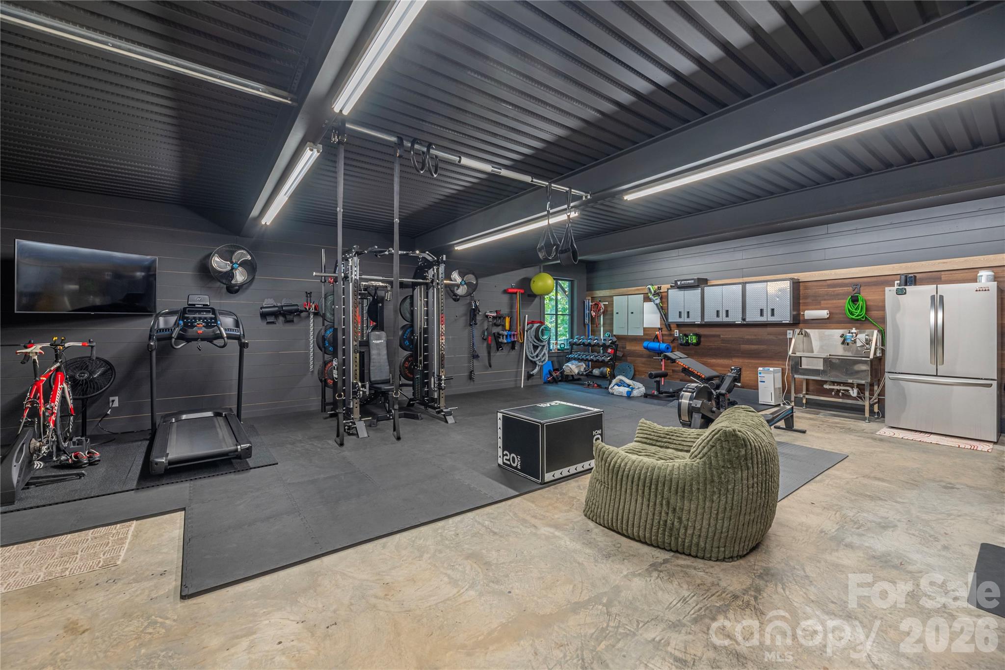 Gym with equipment, tv, and refrigerator - 28 Garren View Drive, Fairview