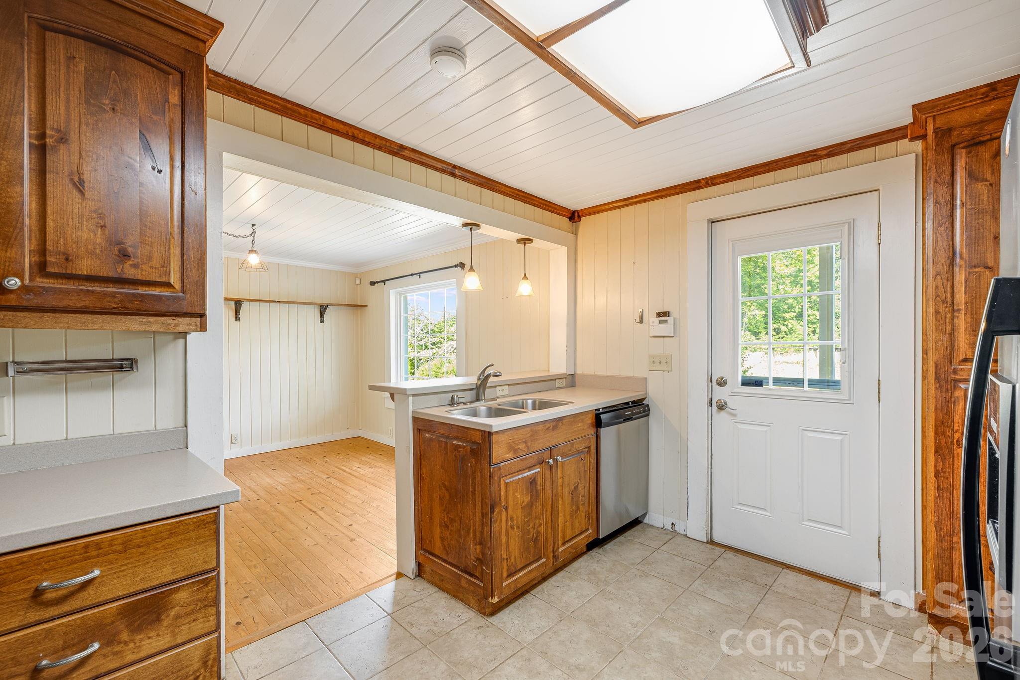 Kitchen looking out towards dining room - 111 Bible School Road, Lake Lure