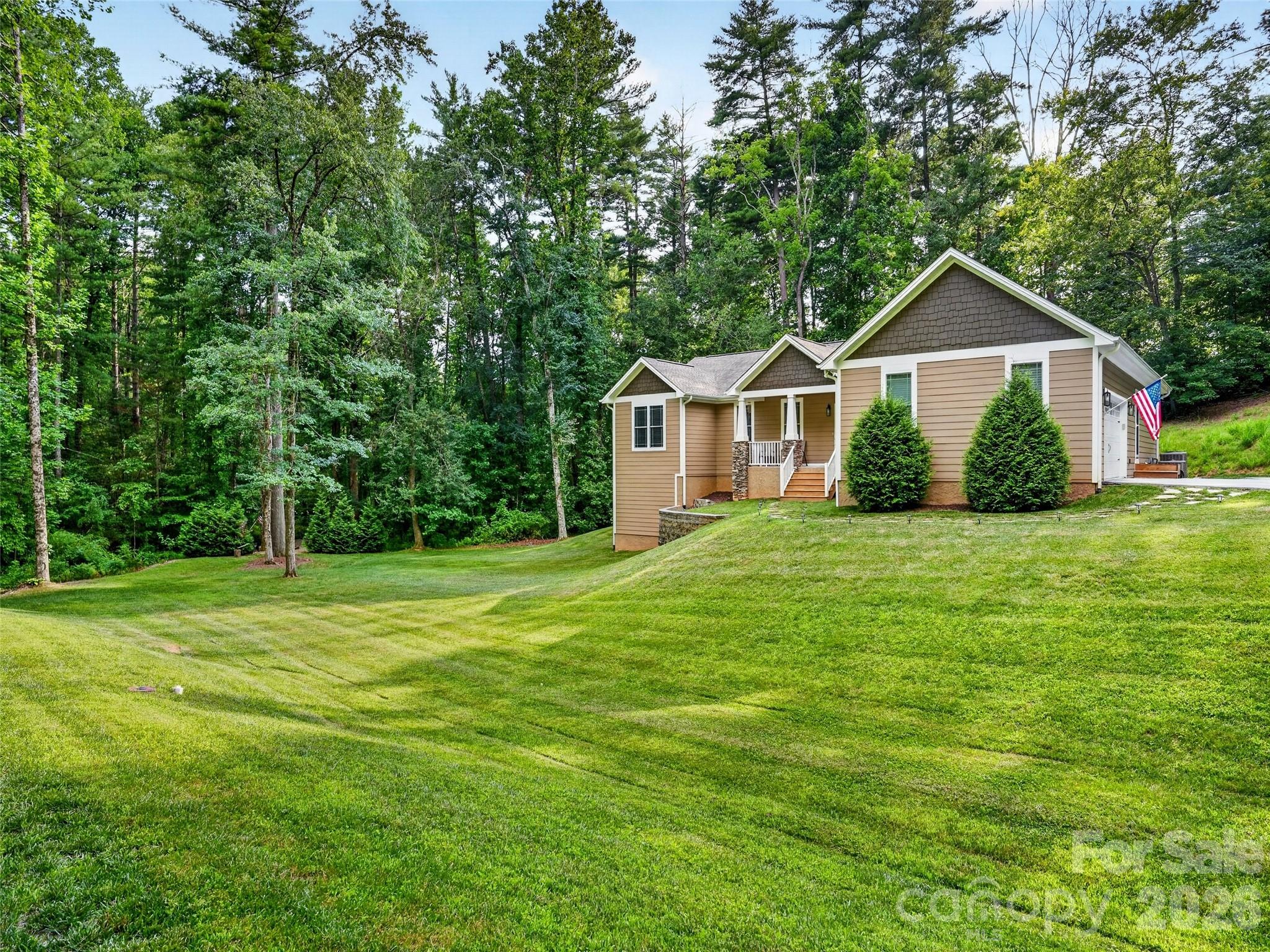 Clean architectural lines softened by a natural wooded backdrop - 290 Sweetwater Hills Drive, Hendersonville