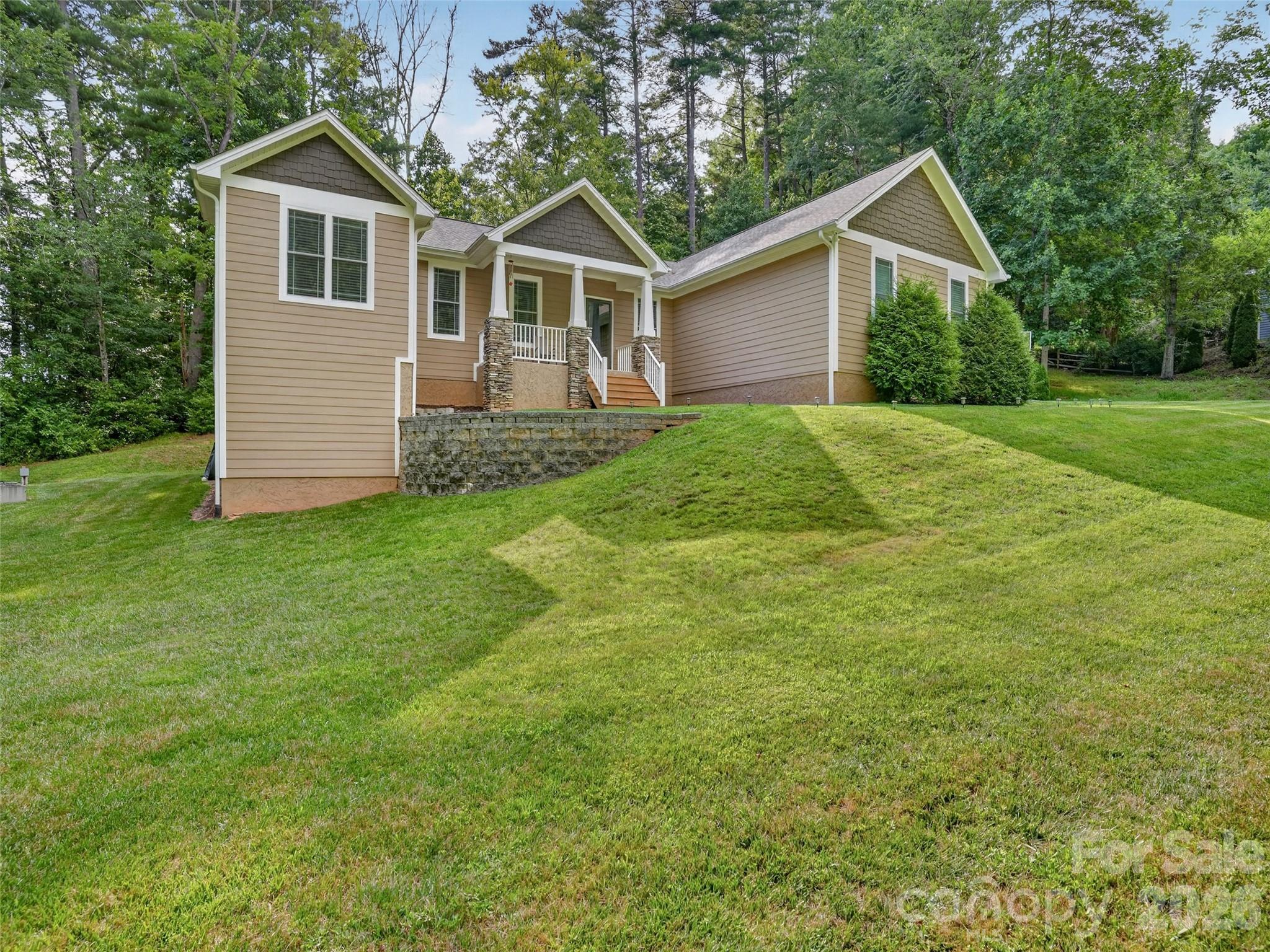 Clean architectural lines softened by a natural wooded backdrop - 290 Sweetwater Hills Drive, Hendersonville