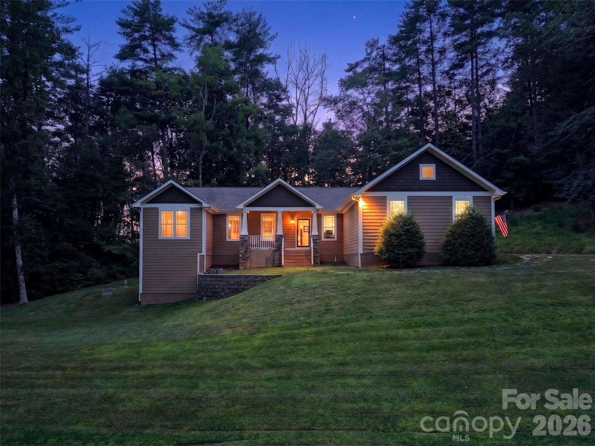 Thoughtfully designed exterior that embraces its natural mountain environment - 290 Sweetwater Hills Drive, Hendersonville
