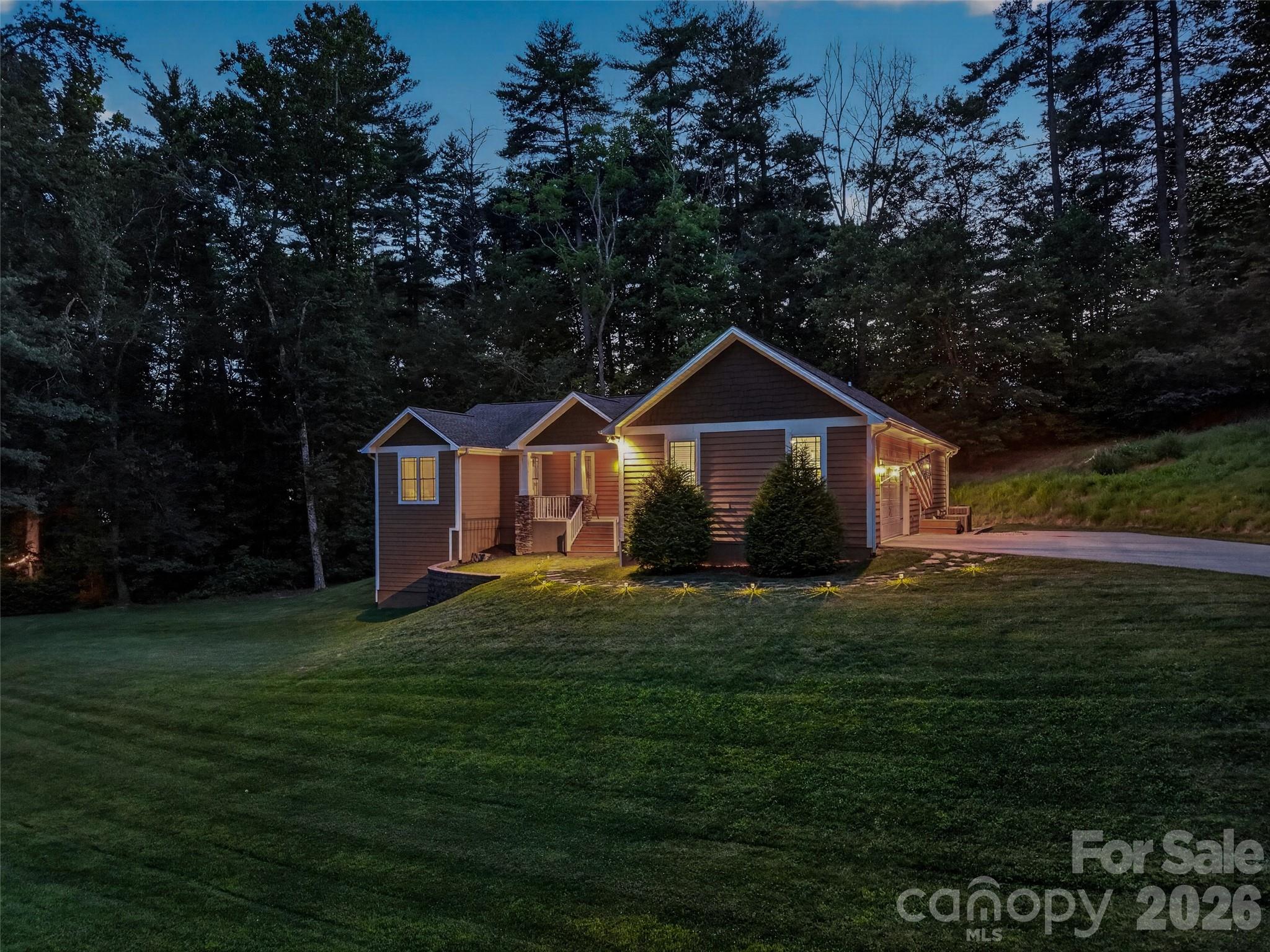 Thoughtfully designed exterior that embraces its natural mountain environment - 290 Sweetwater Hills Drive, Hendersonville