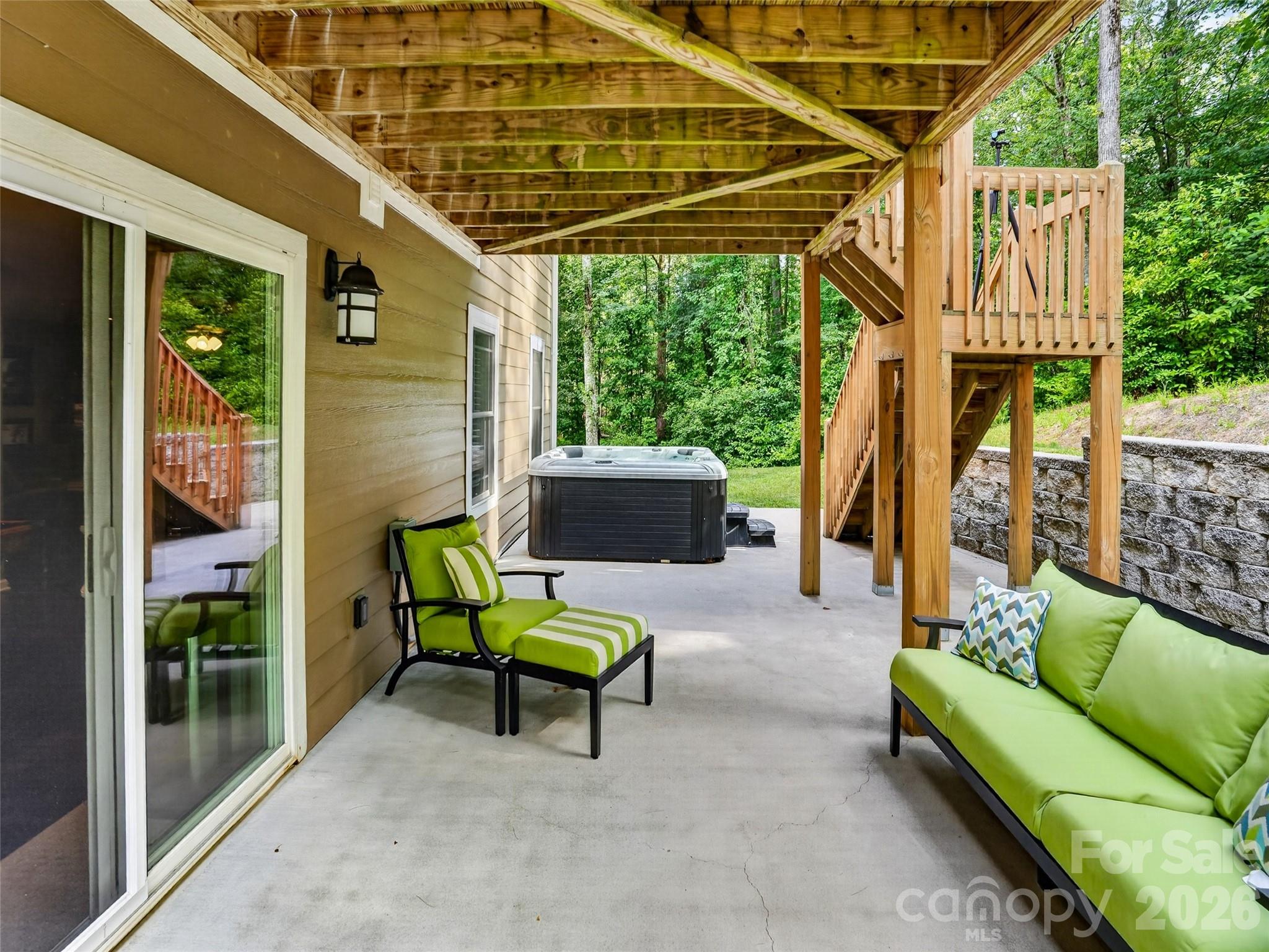 Lower level sitting great for relaxing late in the afternoon - 290 Sweetwater Hills Drive, Hendersonville
