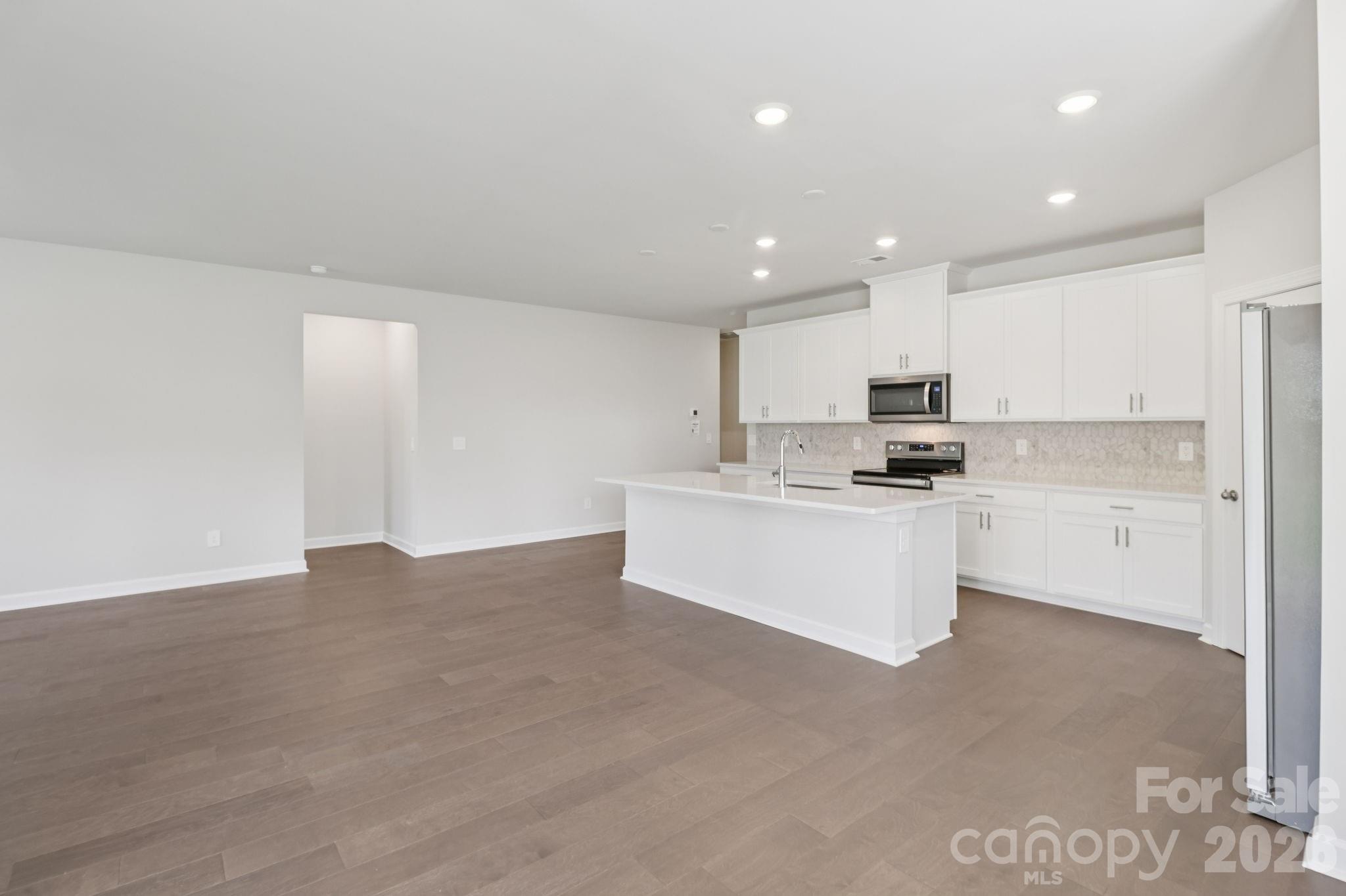 Photo is not of the actual home but is an inspirational photo of builder’s model home and may depict options, furnishings, and/or decorator features that are not included. - 1607 Harper Landing Boulevard, Stanley