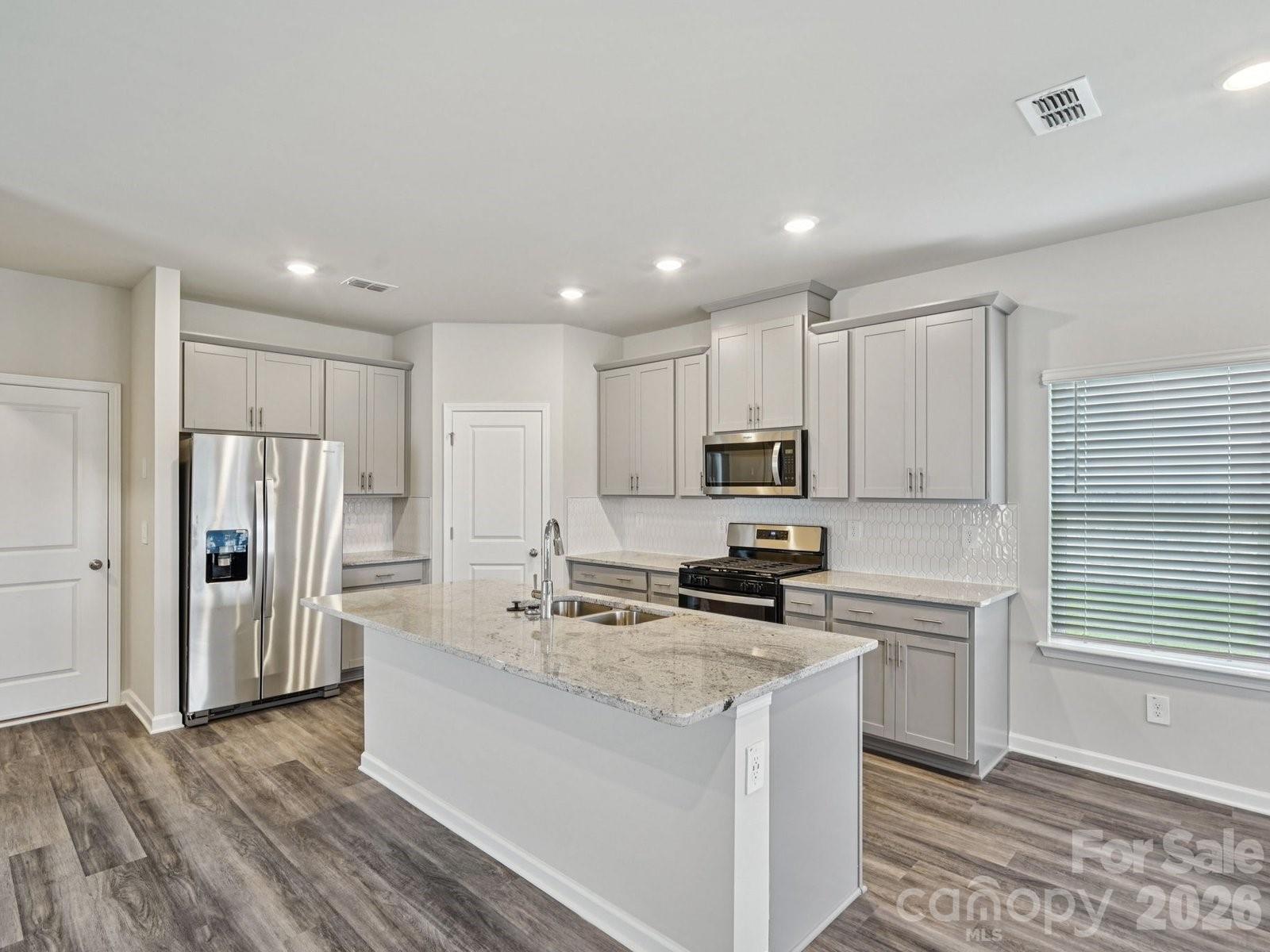 Photo is not of the actual home, but is an inspirational photo of builder’s model home and may depict options, furnishings, and/or decorator features that are not included - 7274 Yardley Street, Gastonia