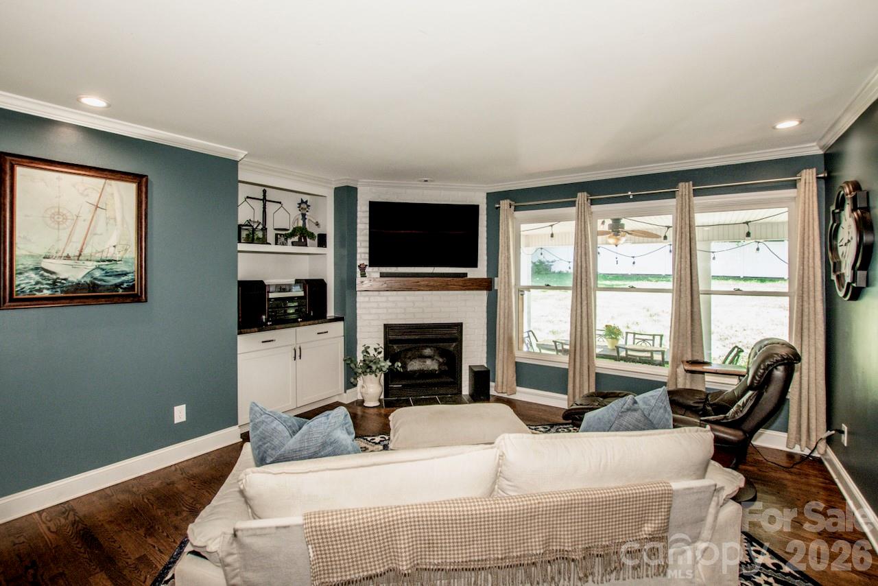 Living room is cozy and pictures don't do it justice. - 921 Argyle Court, Statesville