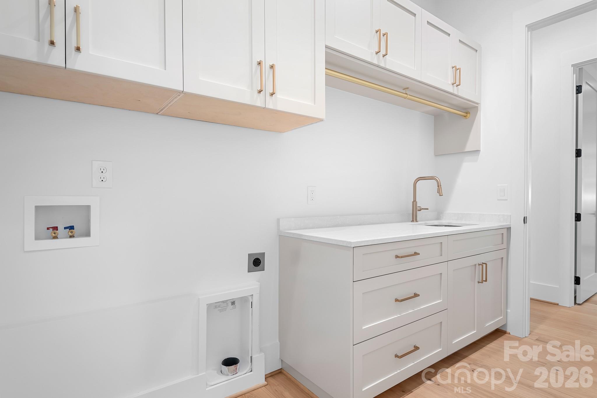 Laundry w/sink connected to Primary Suite - 126 Manorly Lane, Mooresville