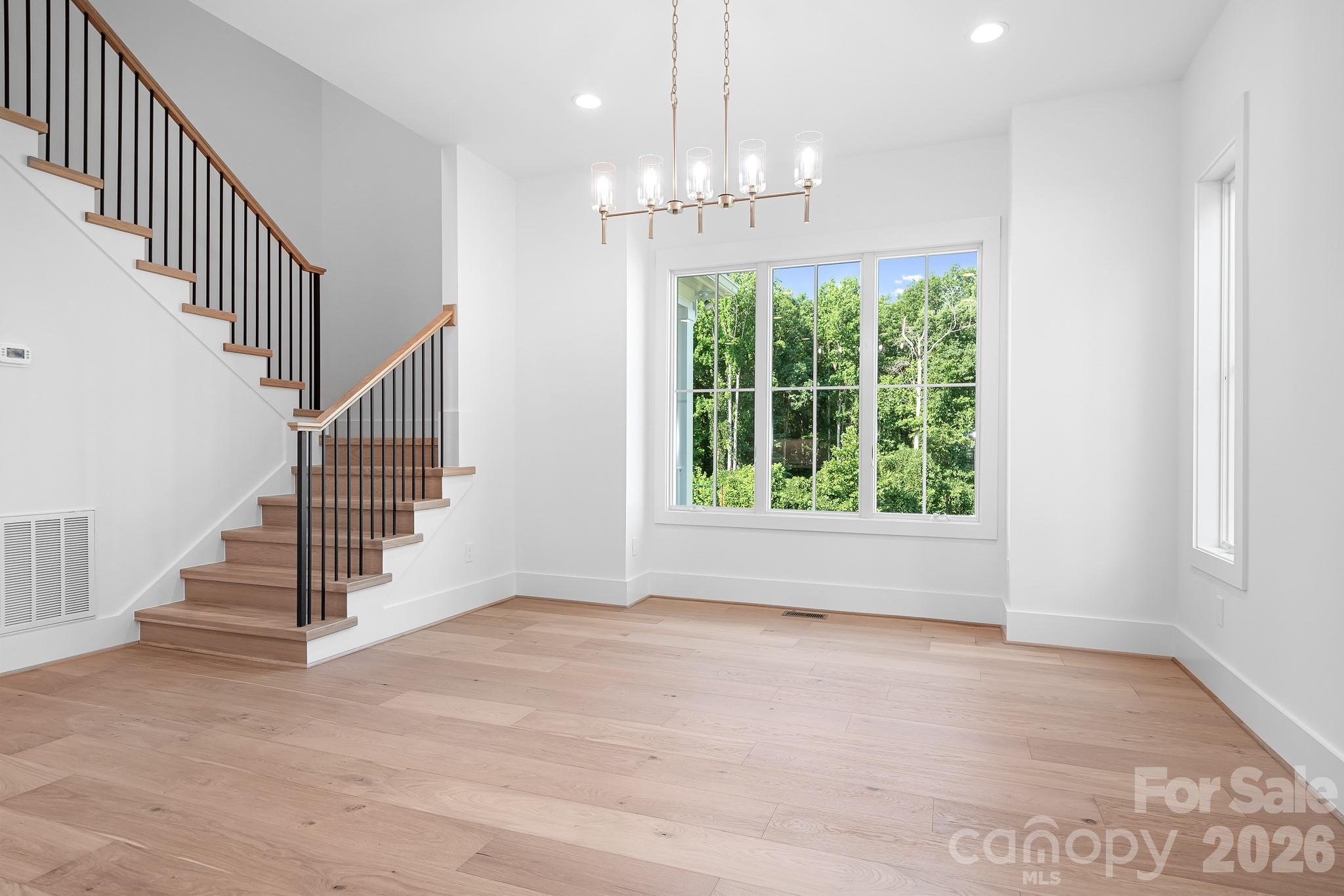 Beautiful stairway and view of park and open lot across the street - 126 Manorly Lane, Mooresville