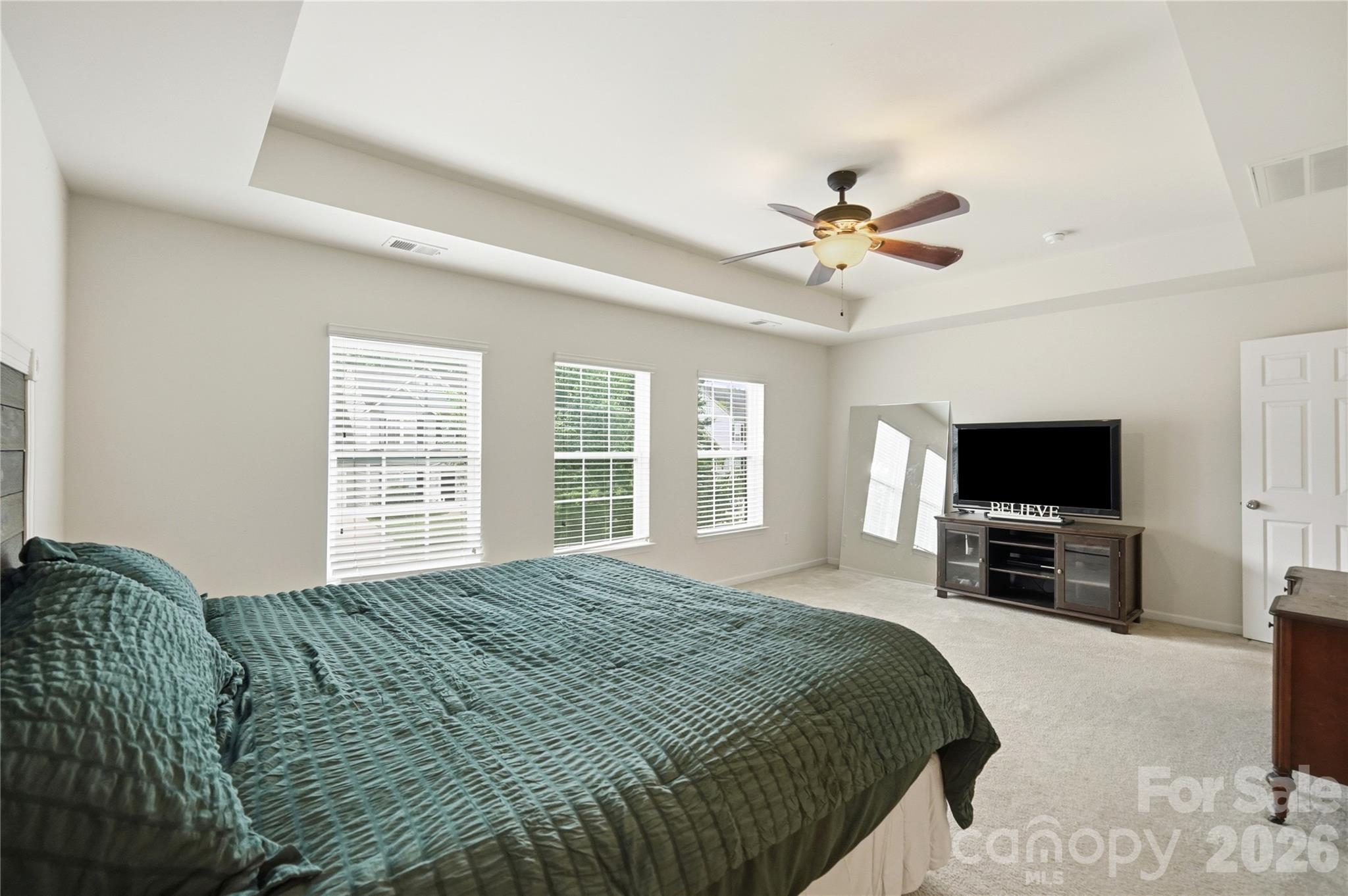 Spacious primary bedroom with space for a sitting area - 1034 Canopy Drive, Indian Trail