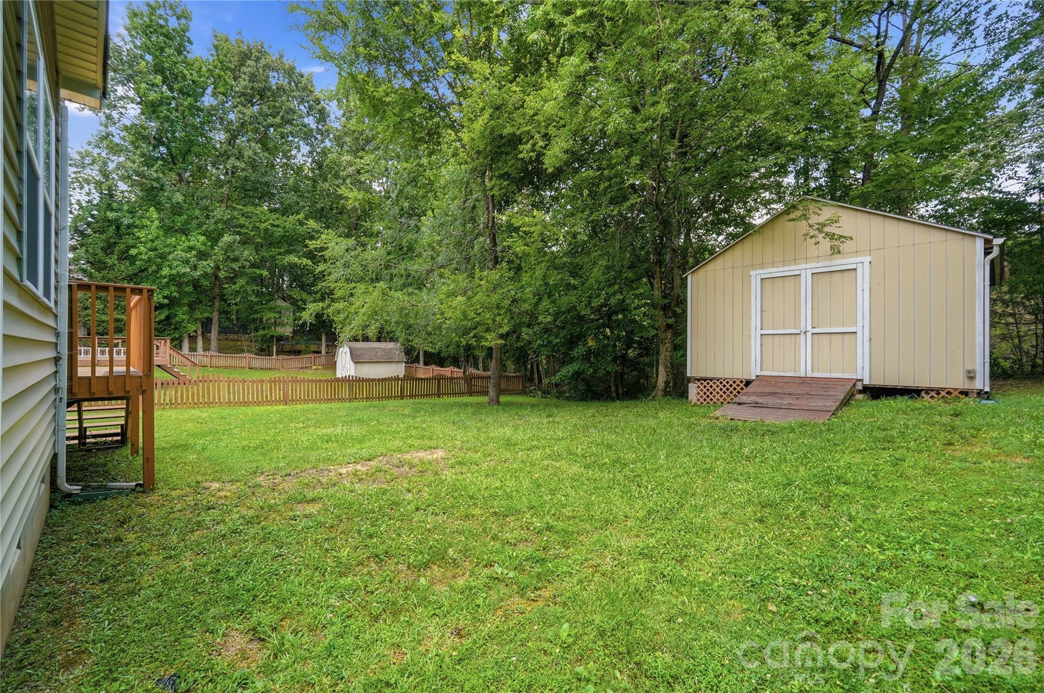 Level backyard with a handy storage shed for all your extras - 1034 Canopy Drive, Indian Trail