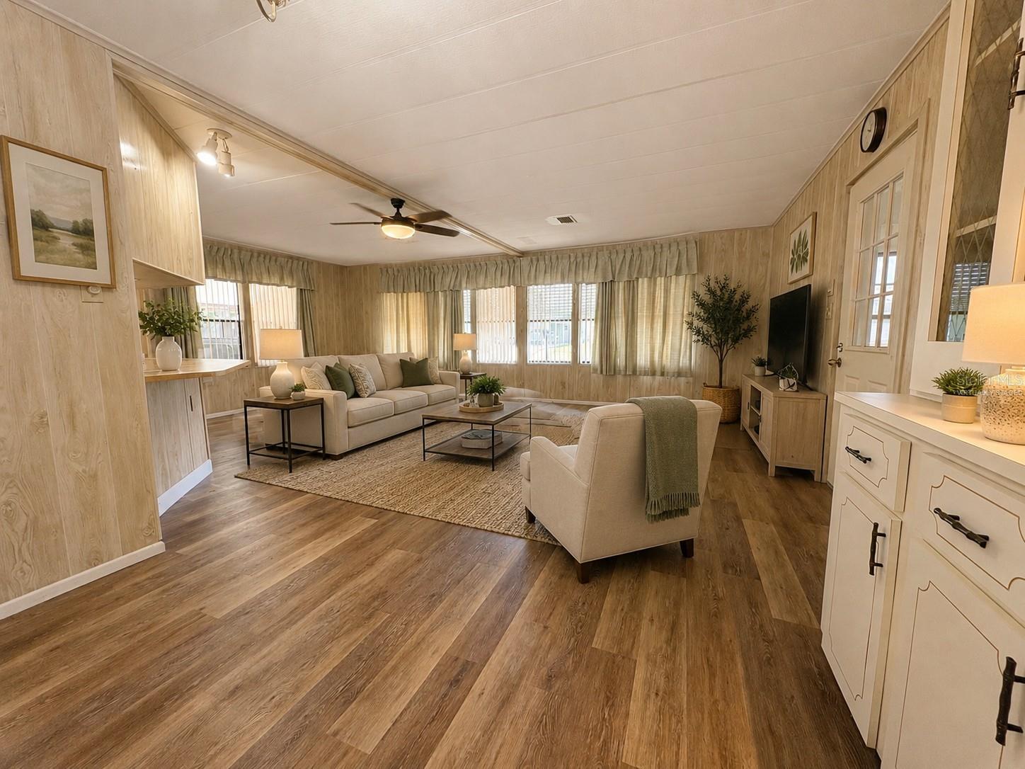 Large Living Area Virtually Staged - 6315 GROVE POINTE DR SE, WINTER HAVEN