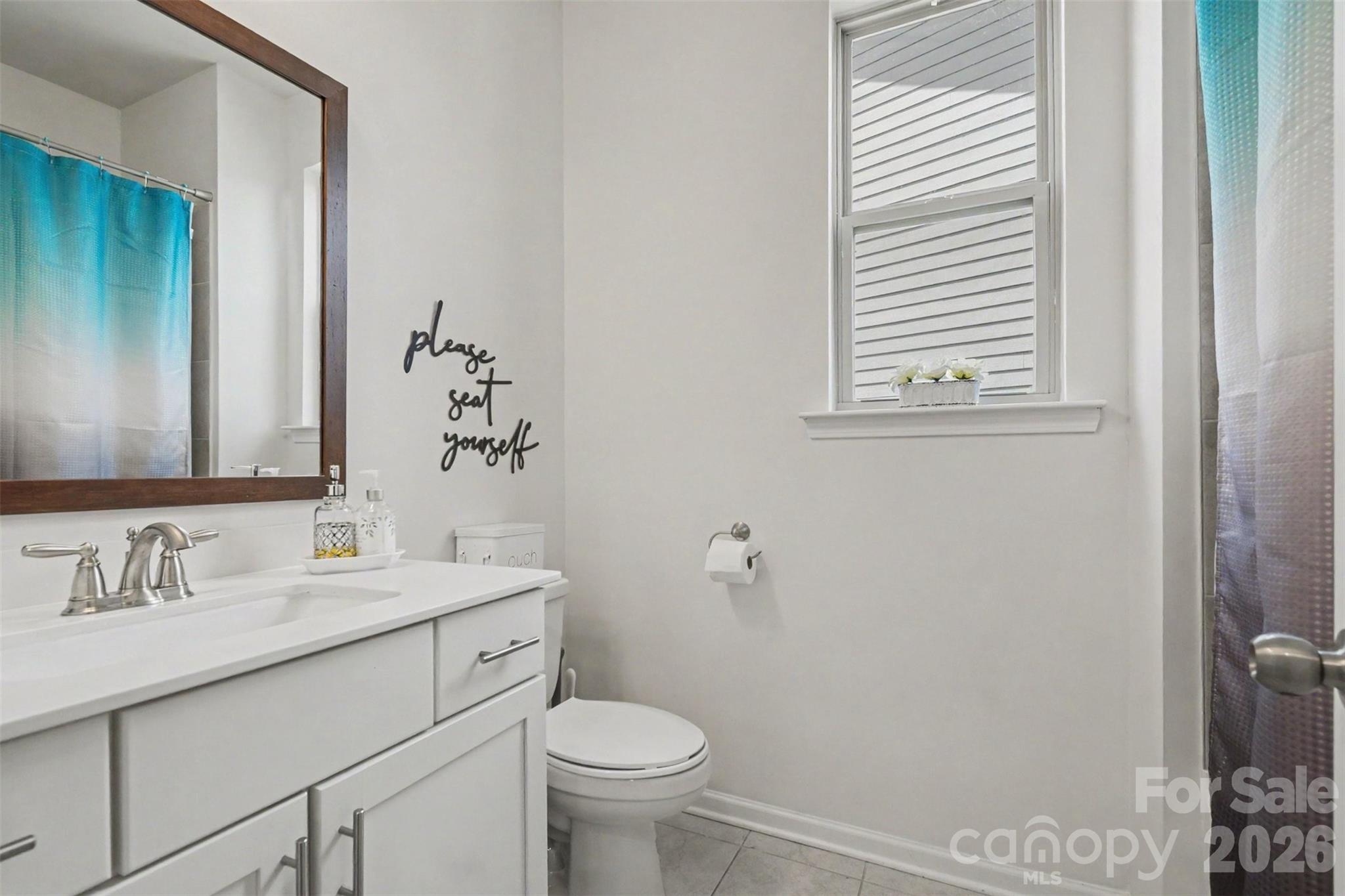 Full bath downstairs features solid counters and a bath/shower combination. - 2055 Yearden Lane, Monroe