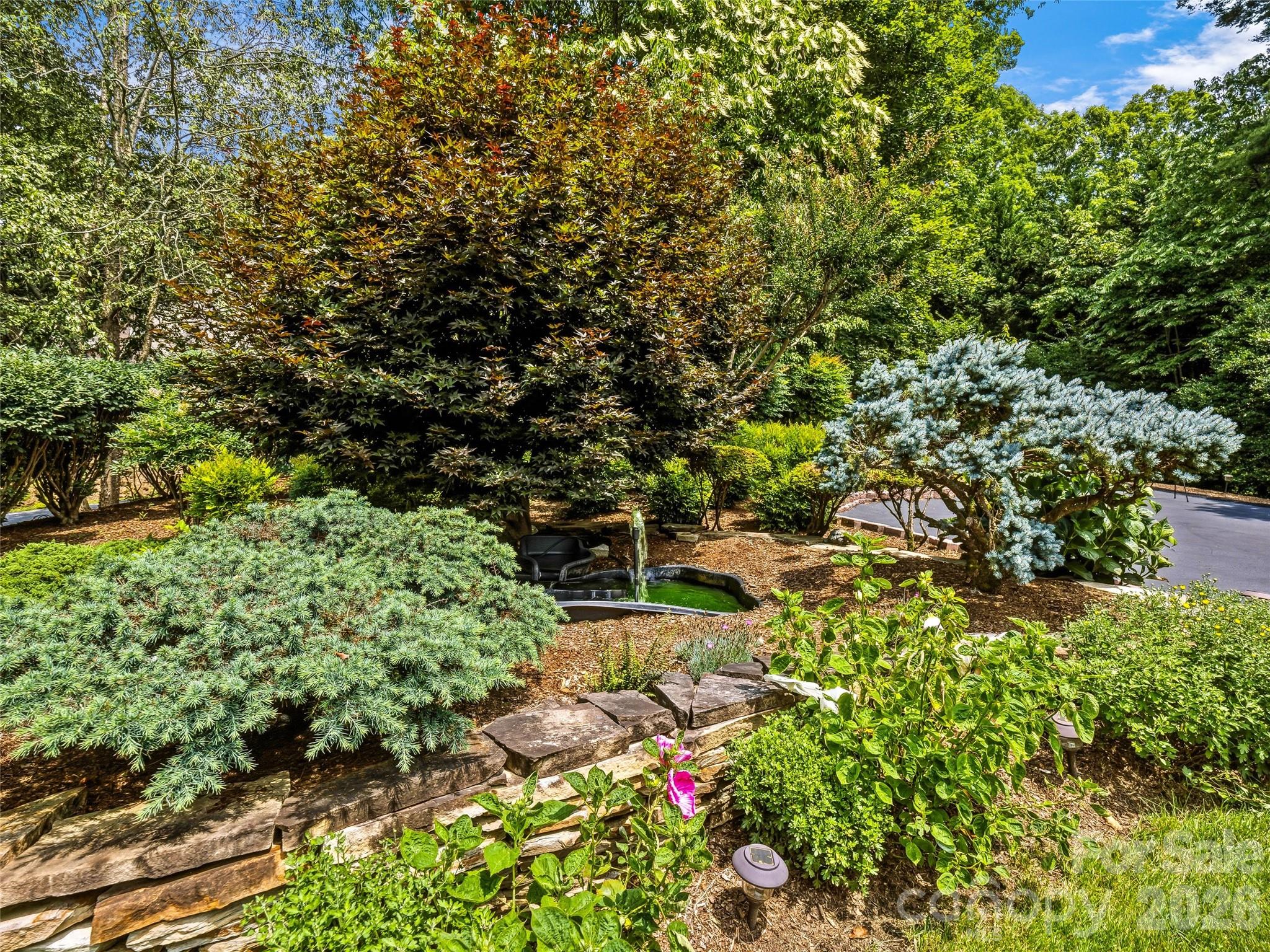 Beautifully Landscaped Entrance - 200 Teaberry Lane, Hendersonville