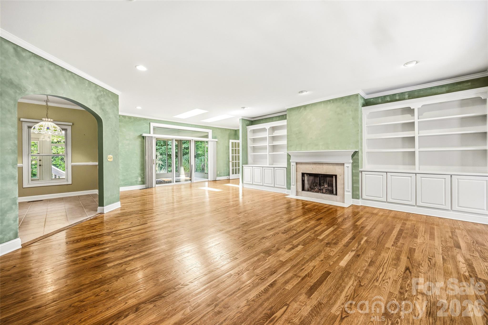 Great Room with Fireplace & Custom Built-Ins - 200 Teaberry Lane, Hendersonville