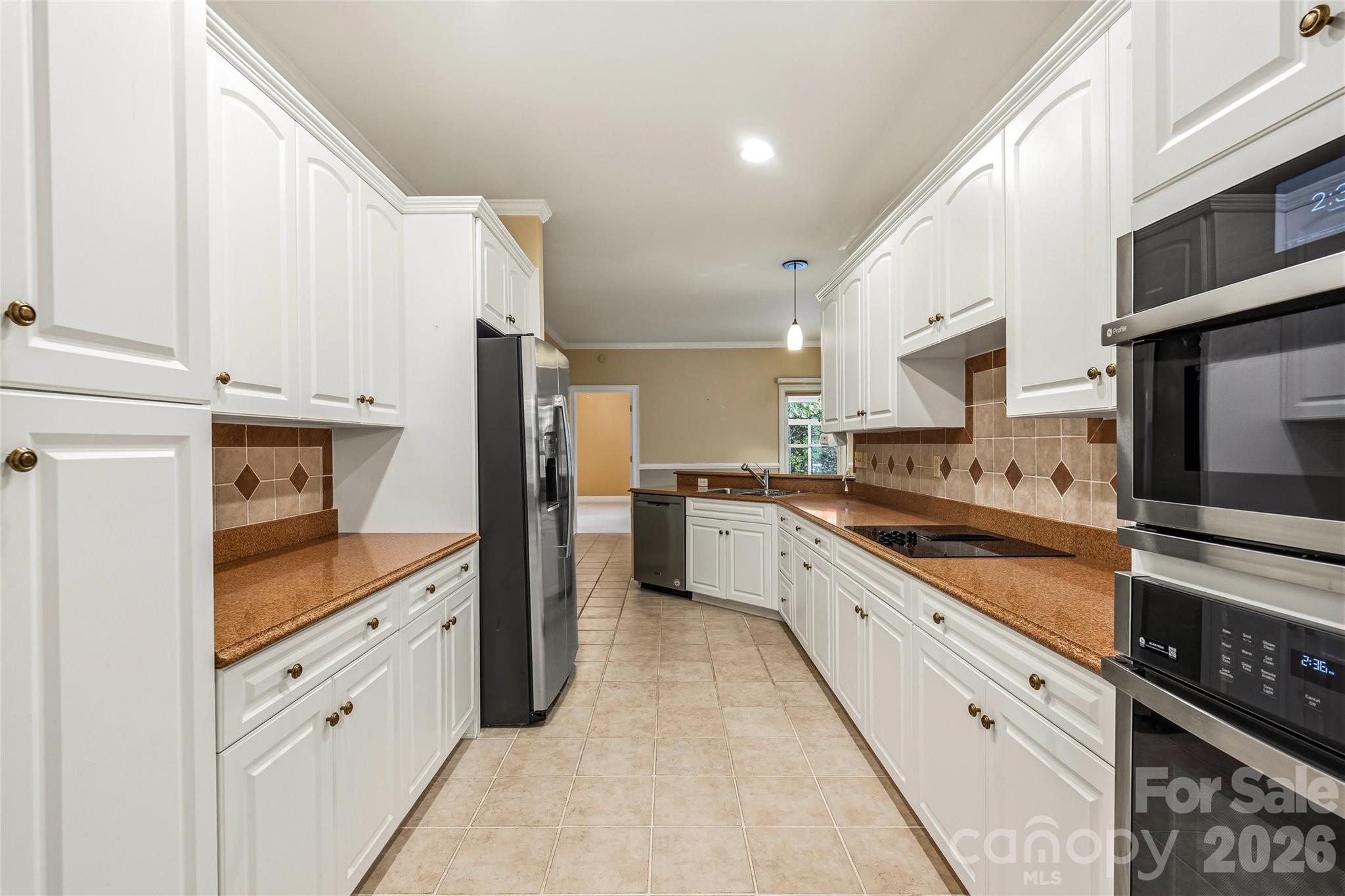 Kitchen with new Stainless Steel Appliances - 200 Teaberry Lane, Hendersonville