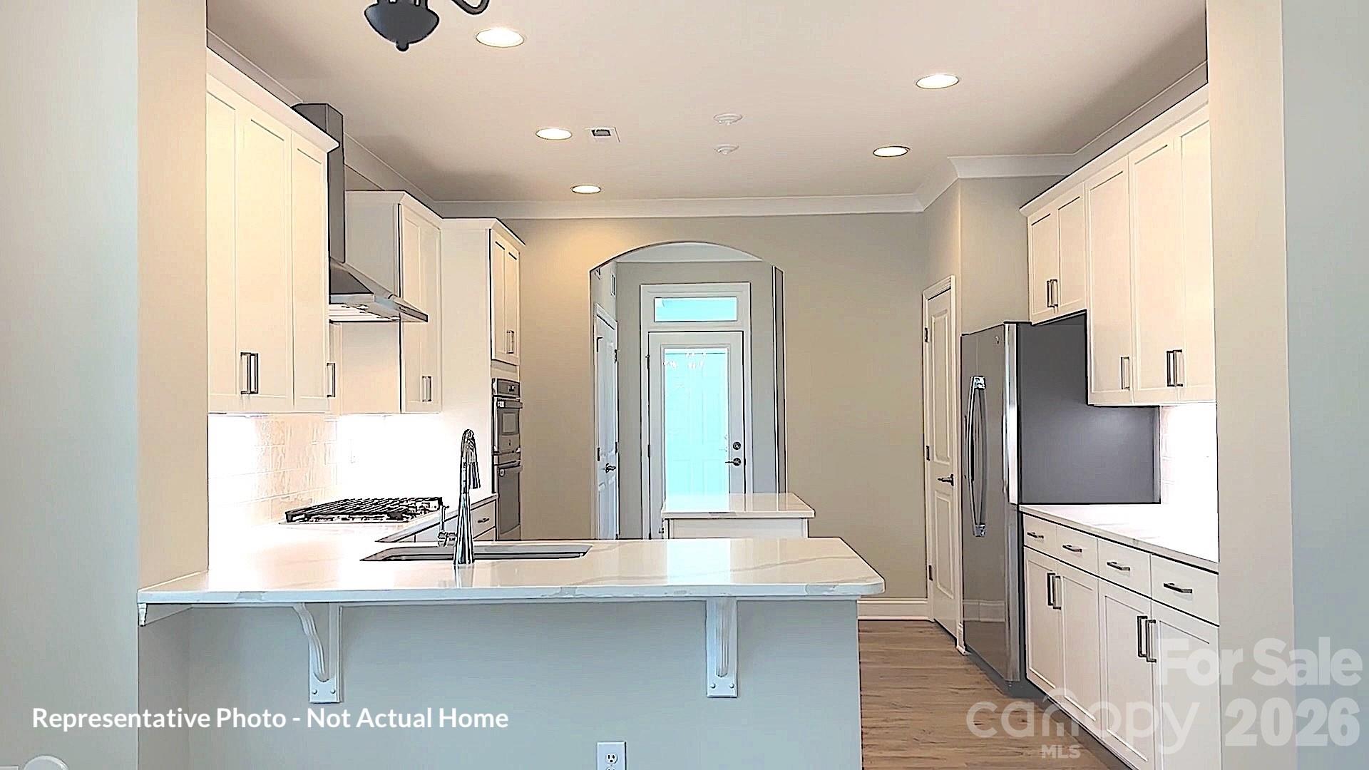 Kitchen with counter height option-Bordeaux - 10231 Rainier Trail Drive NW, Huntersville
