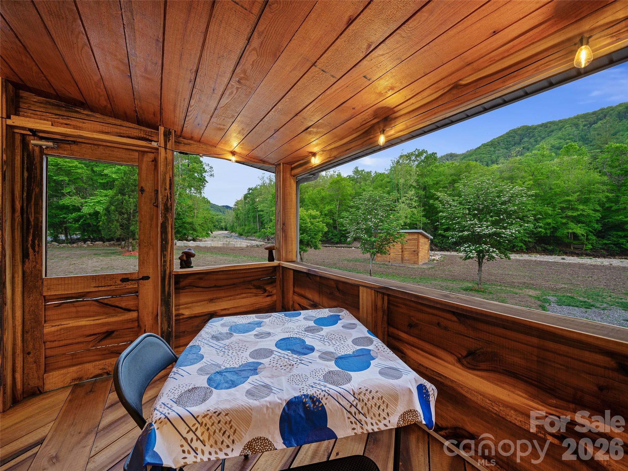 Screened-in evenings and the sounds of rippling river - 326 Ewart Wilson Road, Burnsville