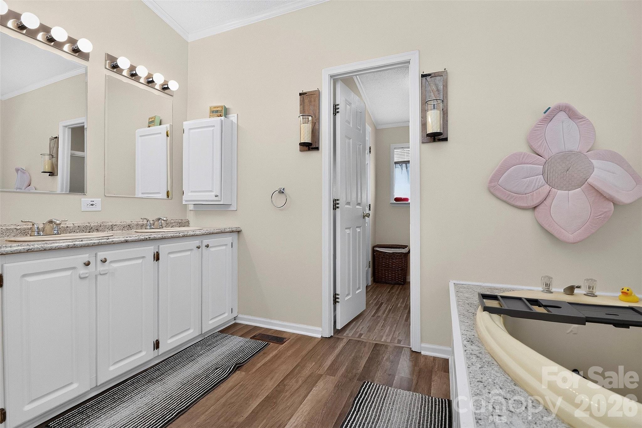 Primary bath features dual sinks and soaking tub! - 602 Timberwood Drive, Fort Mill