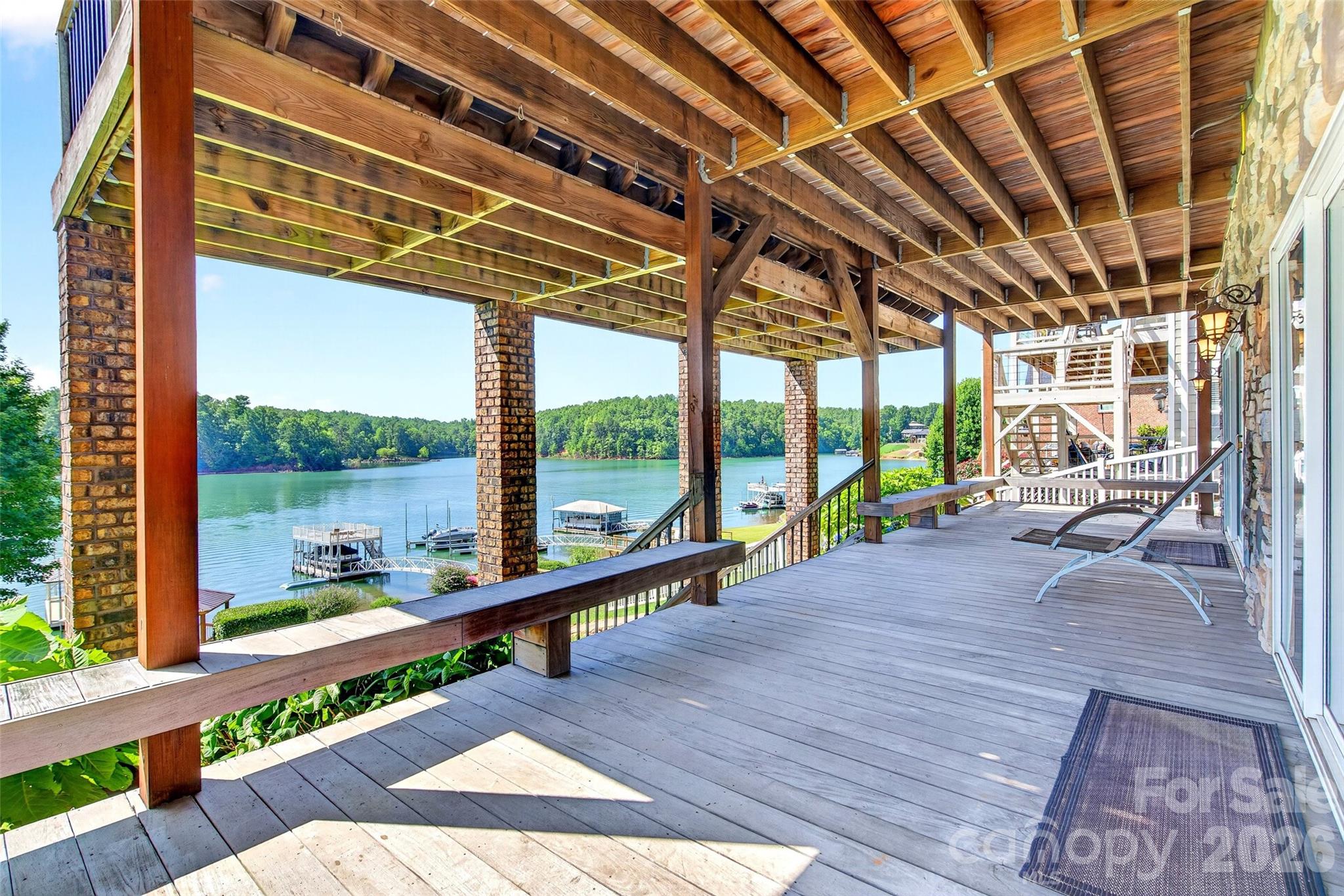 Walk-out lower level with sliding glass door to the lakeside patio and daylight throughout. - 831 Lake Club Drive, Nebo