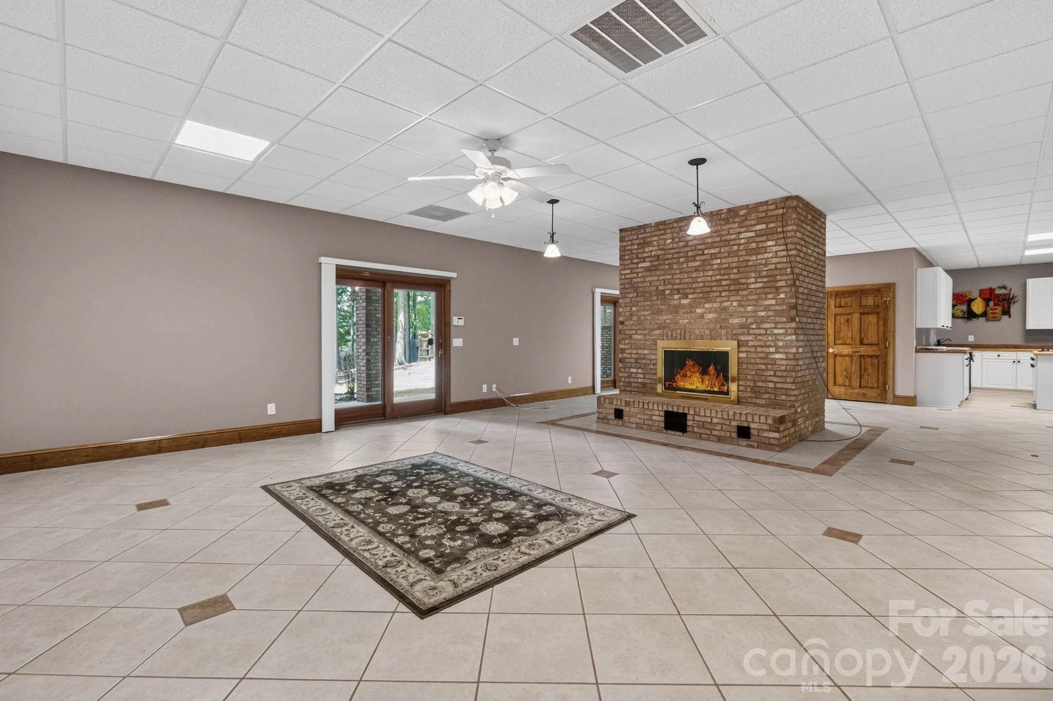 Spacious basement with huge Brick fireplace - 105 Quail Lane, Mooresville
