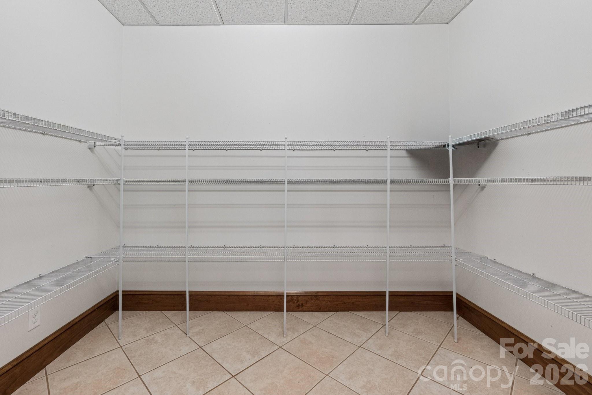 Primary bedroom walk-in closet - 105 Quail Lane, Mooresville