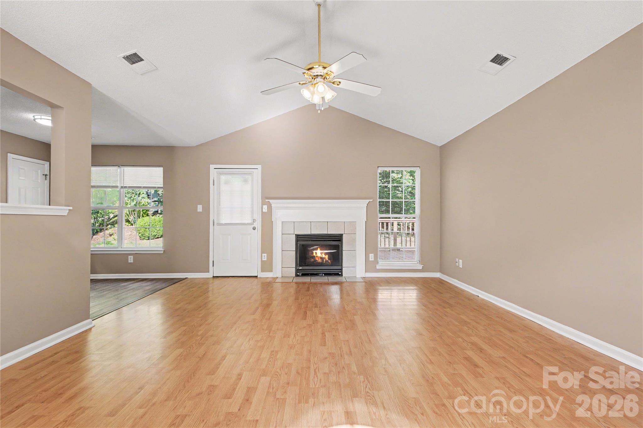 Living room vaulted ceiling fireplace - 3786 Sedgewick Street SW, Concord