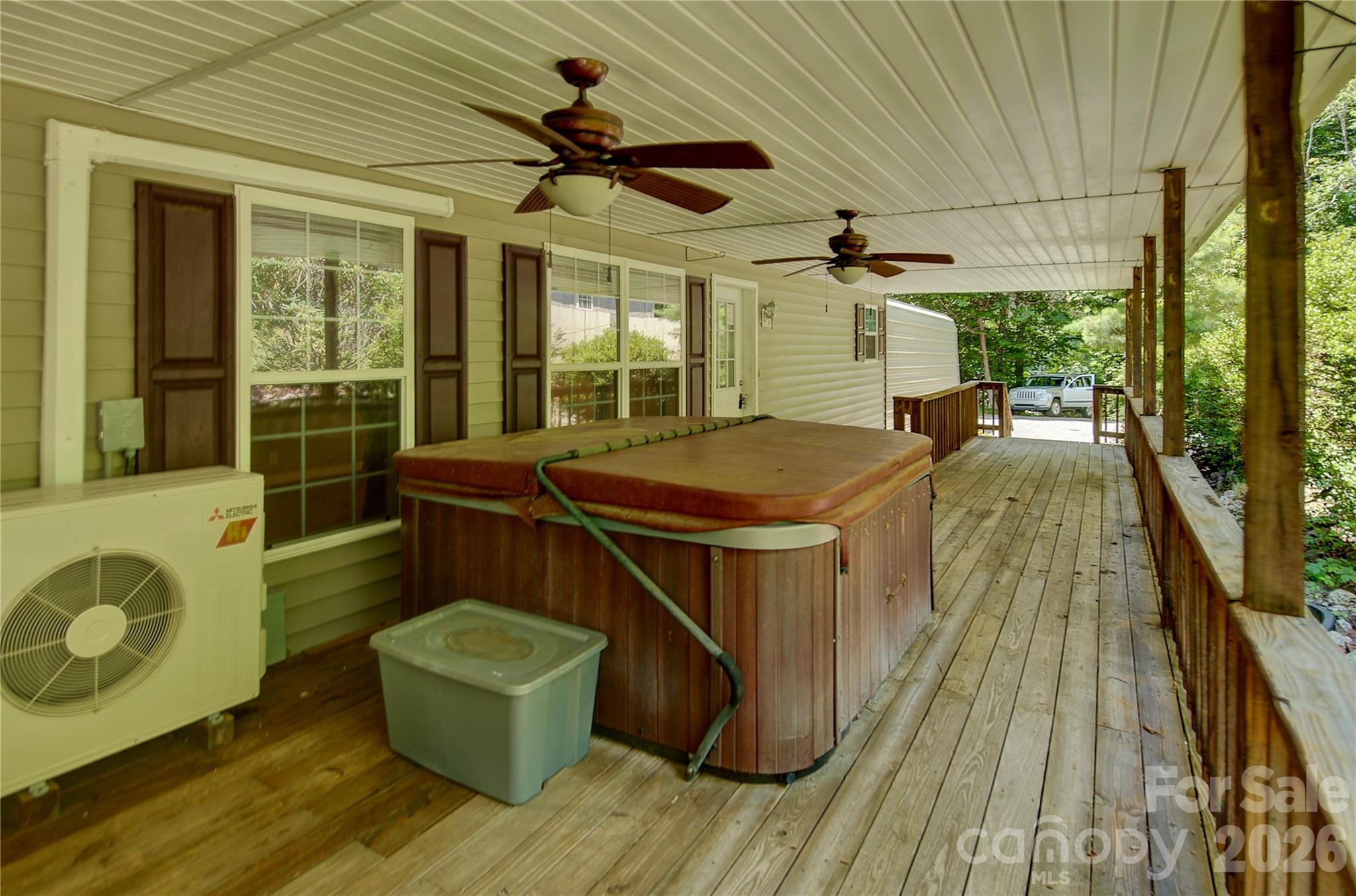 Hot tub on Full Covered back porch - 498 Broad Branch Road, Bakersville