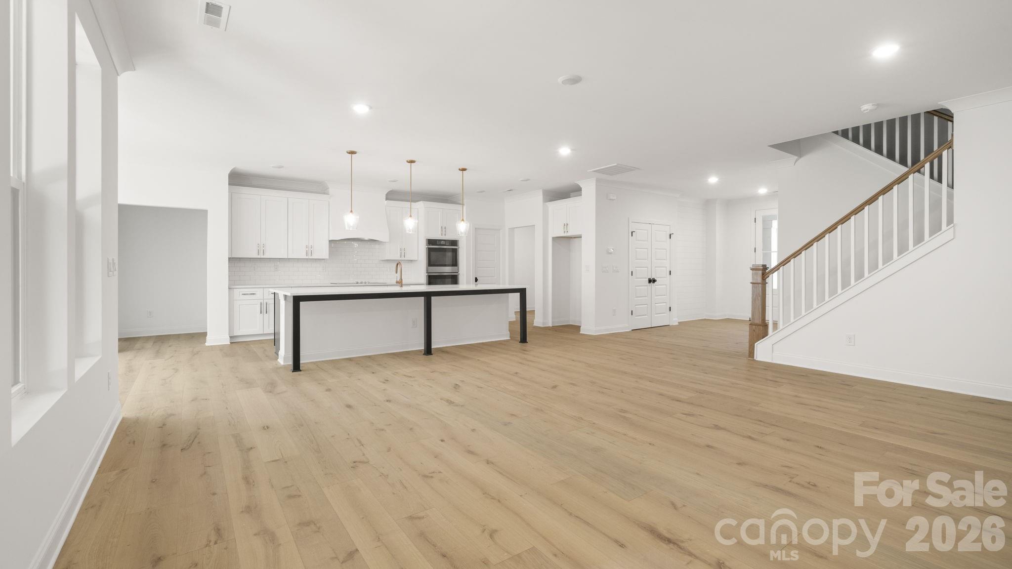 Living to Kitchen - 6774 Kingfisher Court, Denver