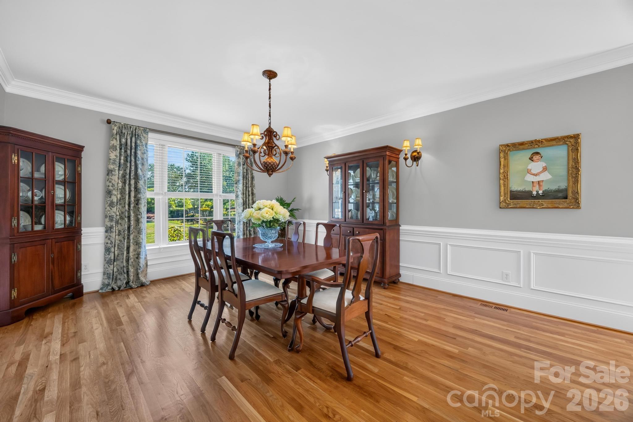 Formal Dining Area- wainscoting and crown molding - 105 Mandarin Drive, Mooresville