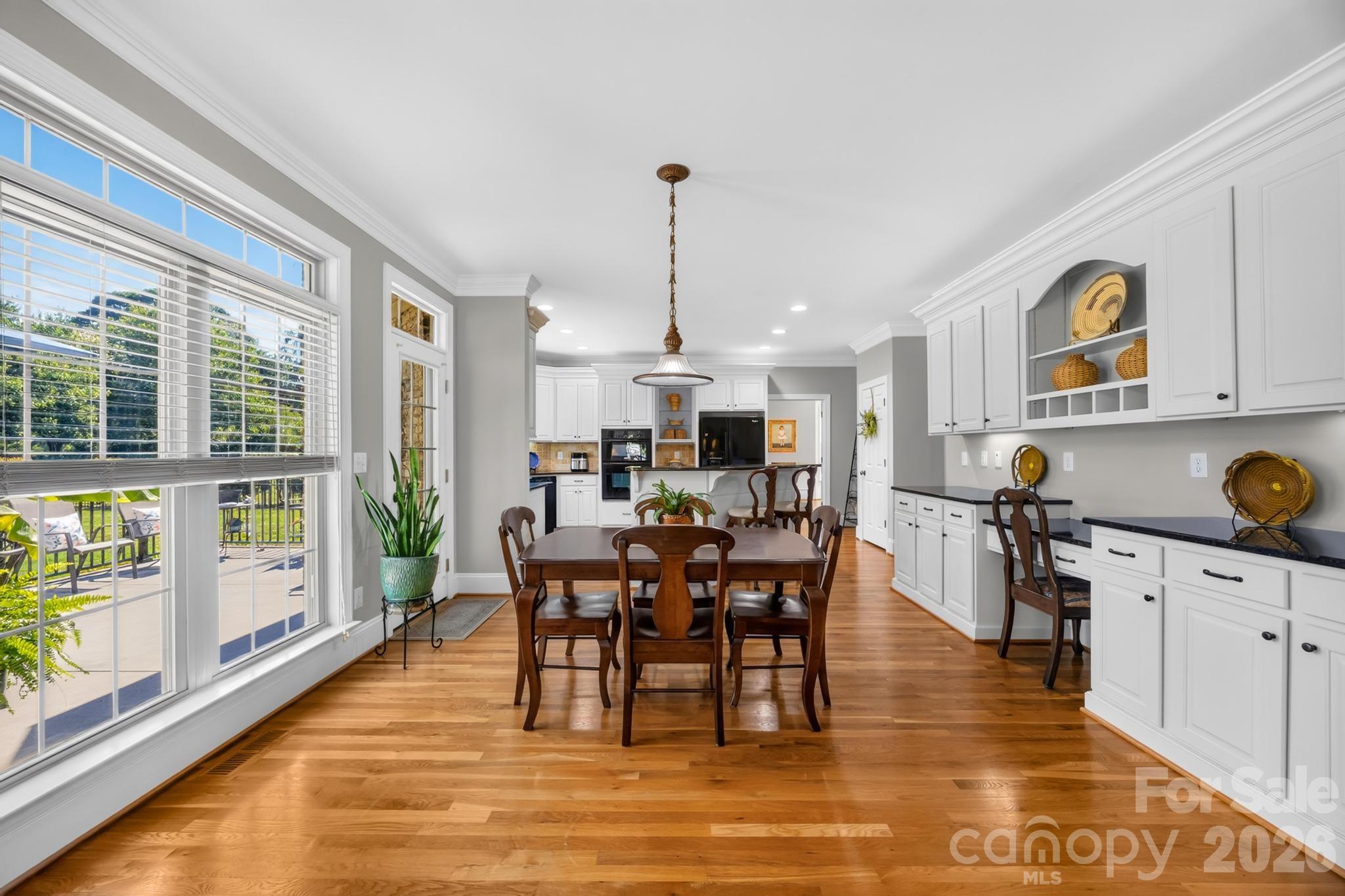 Breakfast Area with built in desk,extra counter space and storage - 105 Mandarin Drive, Mooresville