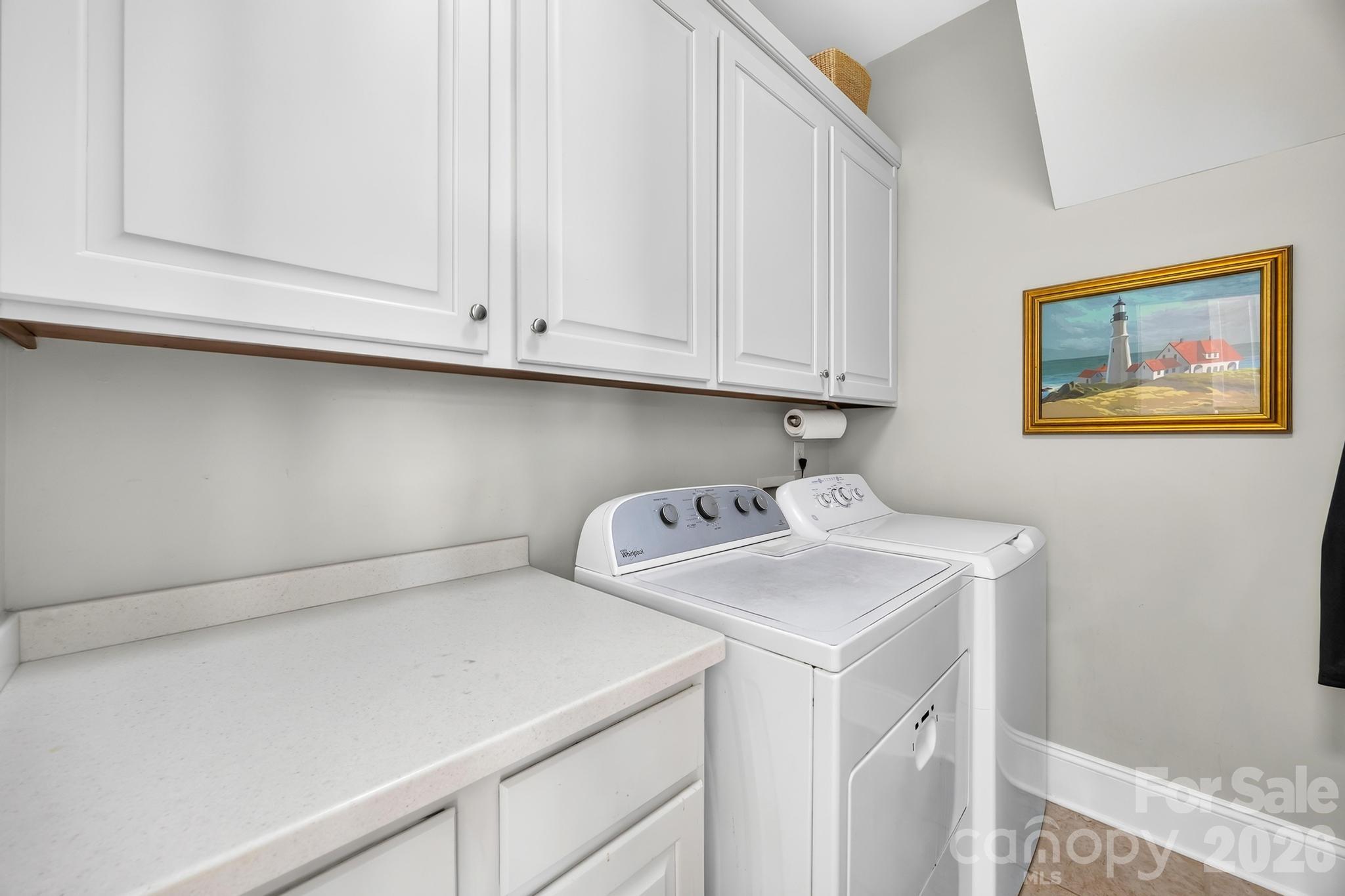 Laundry Room- Main Level-Folding Area and extra cabinets - 105 Mandarin Drive, Mooresville