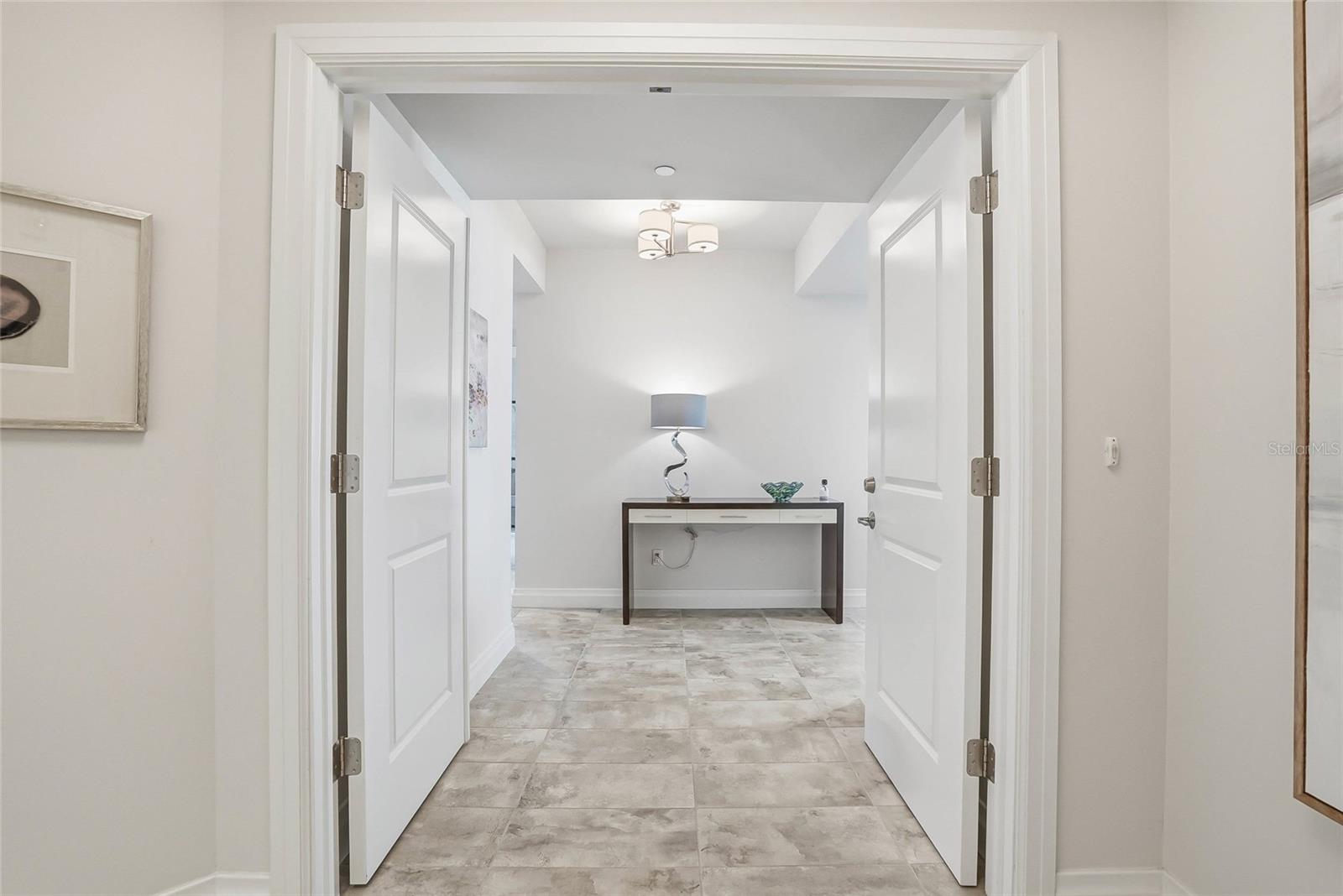 Step off the semi private elevator to your dedicated foyer with double doors. - 650 COLLANY RD #401, TIERRA VERDE