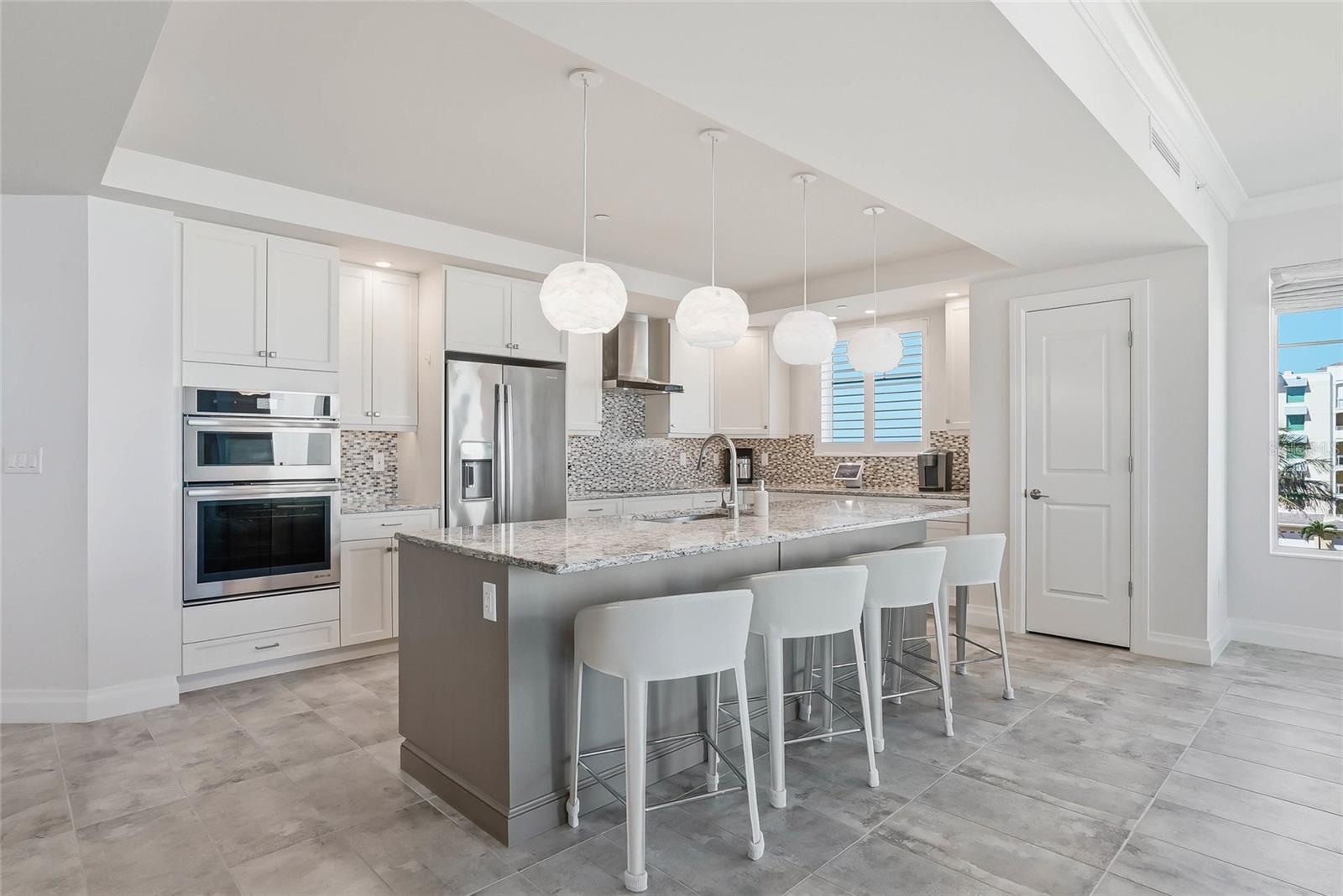This residence has been completely designed by an interior designer - exquisite lighting fixtures and custom window treatment! - 650 COLLANY RD #401, TIERRA VERDE