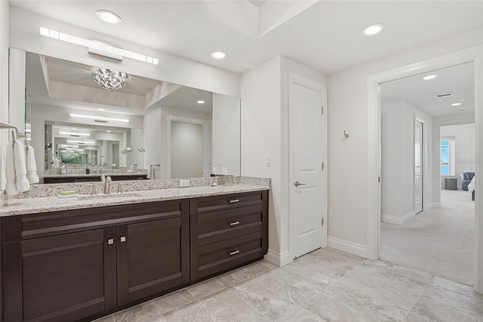 Double vanity in the primary + lots of storage . - 650 COLLANY RD #401, TIERRA VERDE