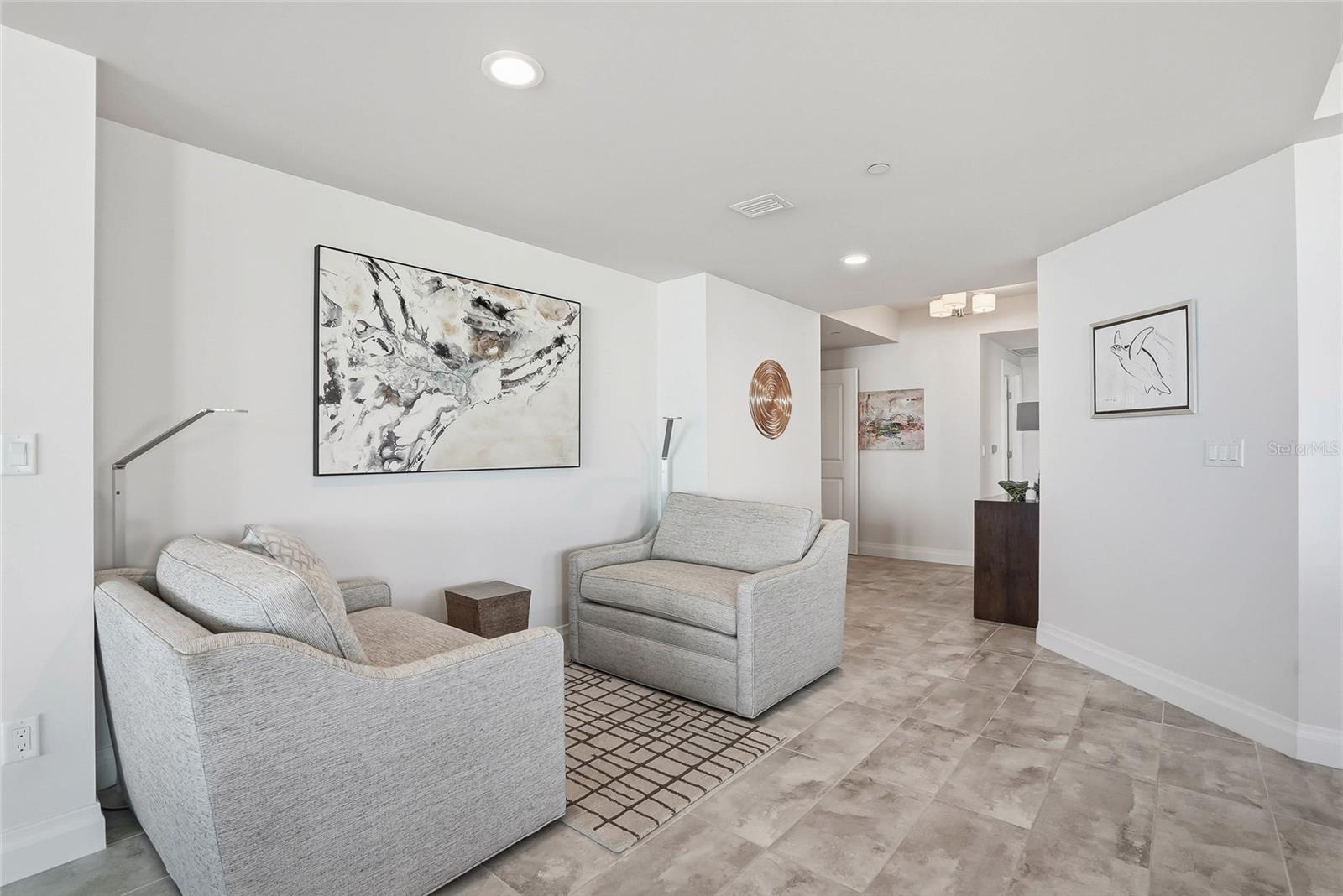 I love this reading nook space. You can keep it as a separate personal space or build a wine bar. - 650 COLLANY RD #401, TIERRA VERDE
